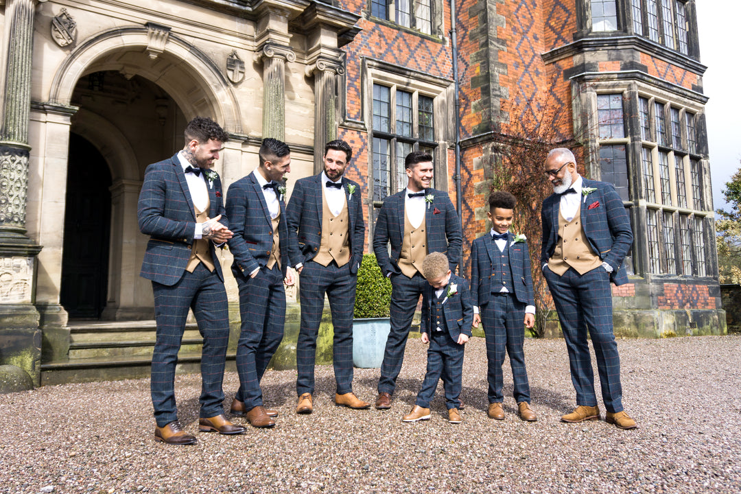 wedding wearing Marc Darcy suits