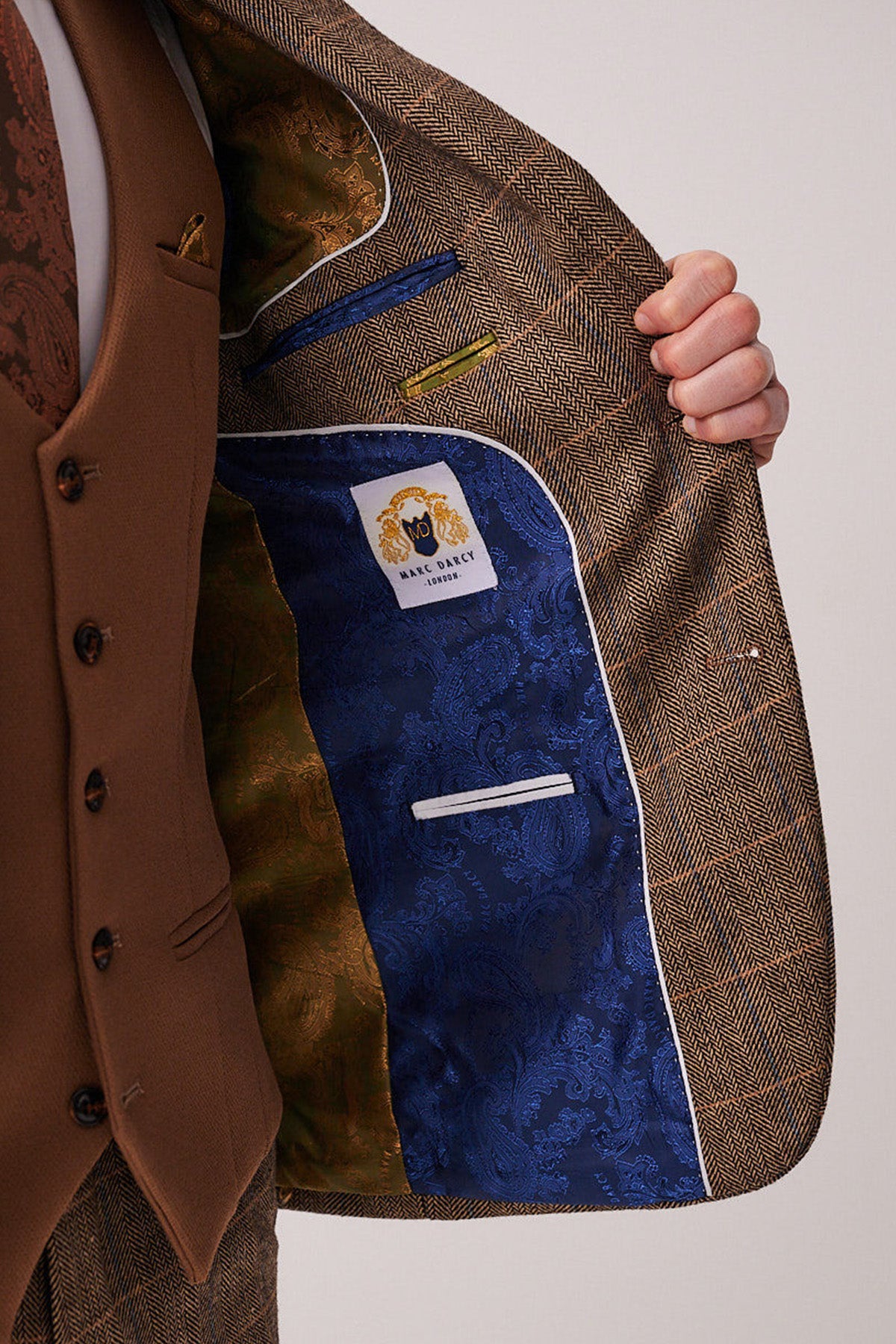 The marcdarcy DX7 Tan Tweed Check Suit with Kelvin Oak Waistcoat features vintage-inspired style, ideal for country weddings or smart events.