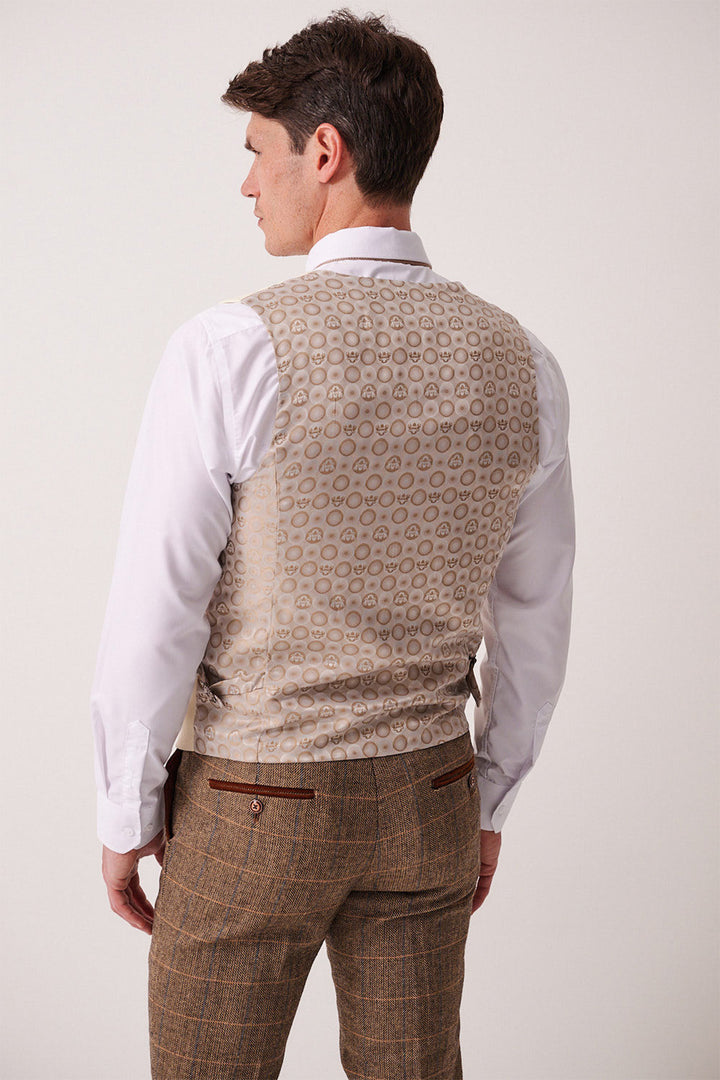 A man is seen from the back wearing the marcdarcy DX7 - Tan Tweed Check Suit with Kelvin Cream Waistcoat, set against a plain light background—ideal for a country wedding or vintage-inspired occasion.