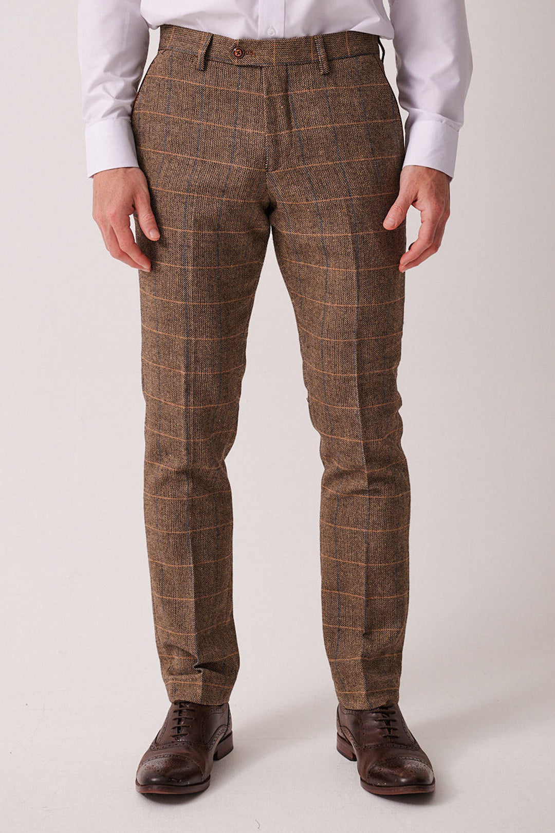 A man wearing the marcdarcy DX7 - Tan Tweed Check Suit with Kelvin Oak Waistcoat stands facing forward against a plain background—ideal for a country wedding or pairing with a herringbone slim fit blazer.