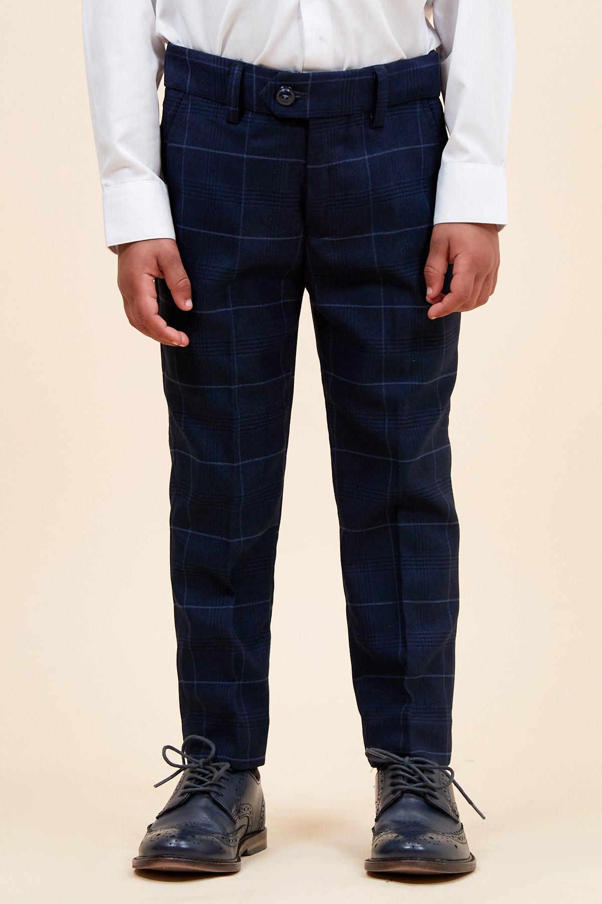 A child models the EDINSON - Children's Navy Sky Check Print Three Piece Suit by Marc Darcy, cropped from shoulders down, against a beige background—ideal inspiration for a stylish kids' wedding or occasion outfit.