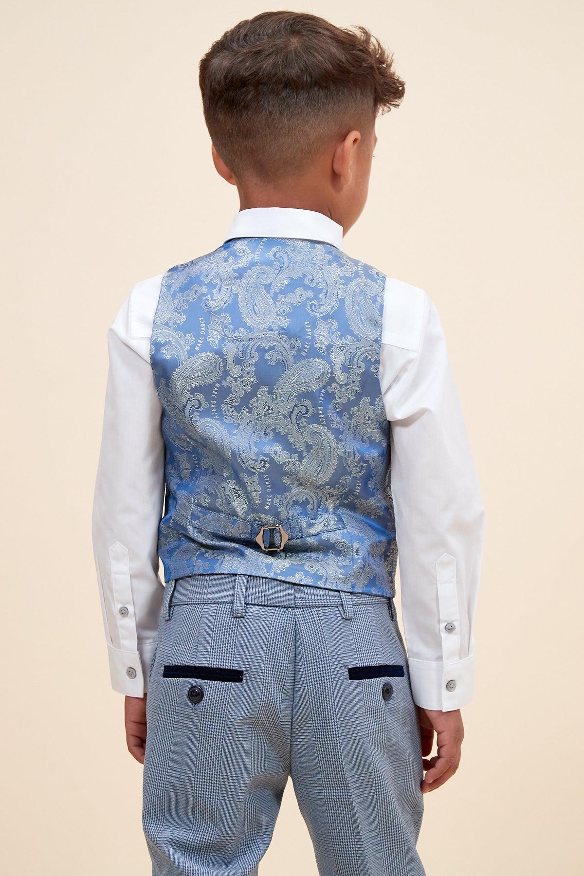 A young boy, seen from behind, wears the Marc Darcy BROMLEY Children's Sky Blue Check Print Three Piece Suit.