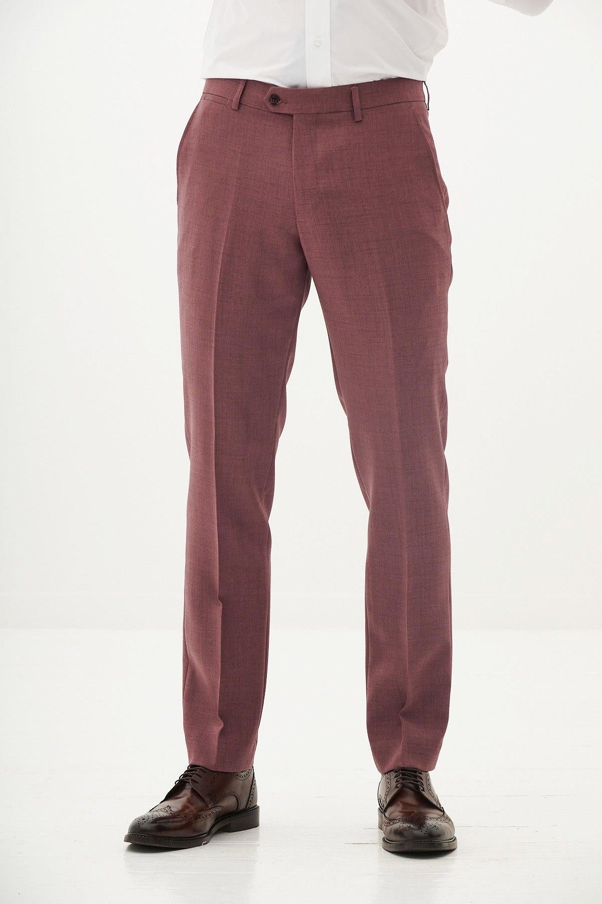 A person models the Marc Darcy MONTY - Mauve Two Piece Suit with a white shirt and brown dress shoes, standing against a plain white background. The image is cropped at the shoulders.