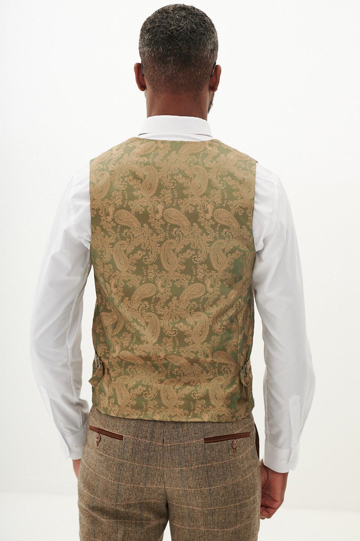 A man from behind wears a white shirt and the marcdarcy TED - Tan Tweed Check Waistcoat with brown tweed pants—ideal for a country barn wedding.