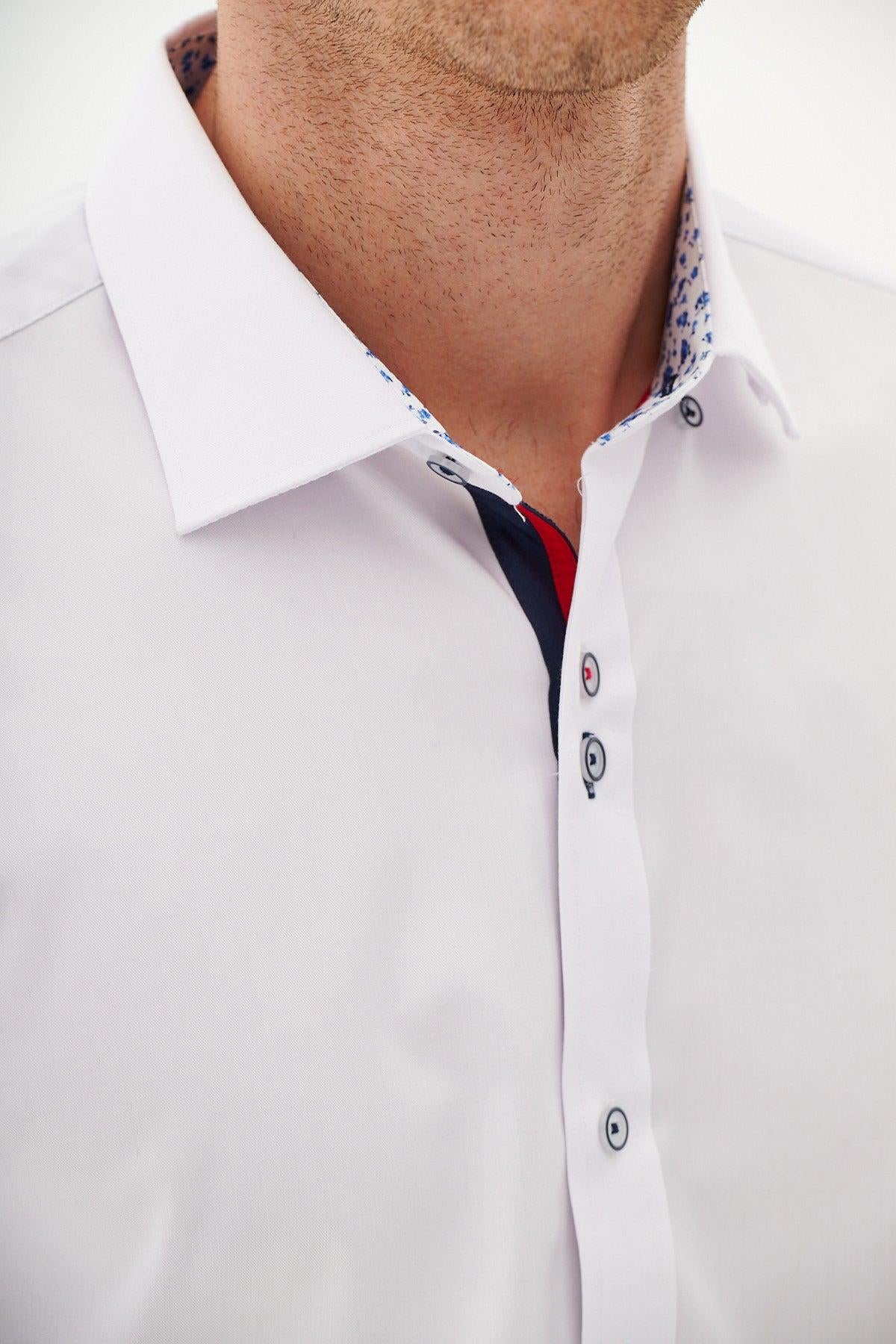 A close-up of a man's lower face and neck wearing the Marc Darcy LUKE white long sleeve shirt, featuring blue and red inner collar accents, contrasting buttons, and ideal for office wear.