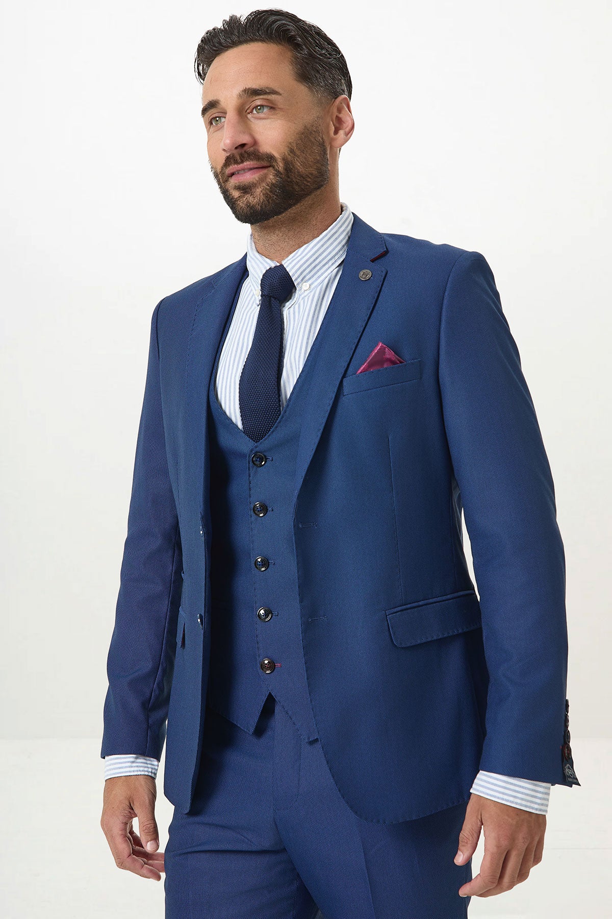 Elevate your workwear with the Marc Darcy DANNY Royal Blue Three Piece Suit, featuring a single-breasted waistcoat—pair it with a striped shirt, navy tie, and maroon pocket square for a sharp, sophisticated look.