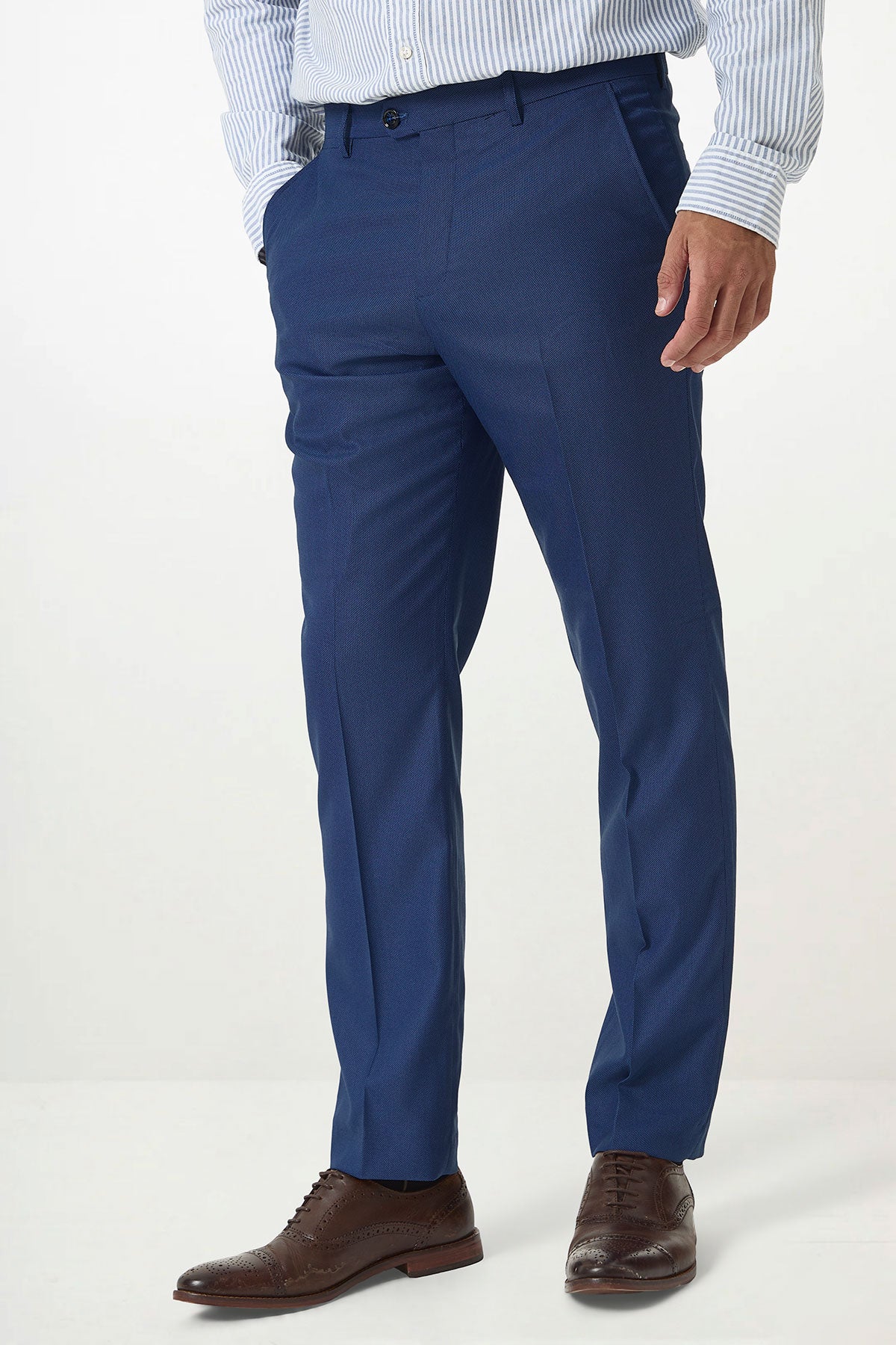 A person wears the Marc Darcy DANNY Royal Blue Three Piece Suit with a single-breasted waistcoat, creating an elevated workwear look against a plain background.