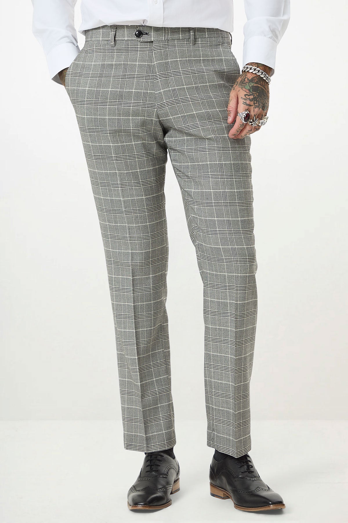 Man wearing the Marc Darcy ROSS Grey Check Three Piece Suit with double-breasted waistcoat, white shirt, and black dress shoes.
