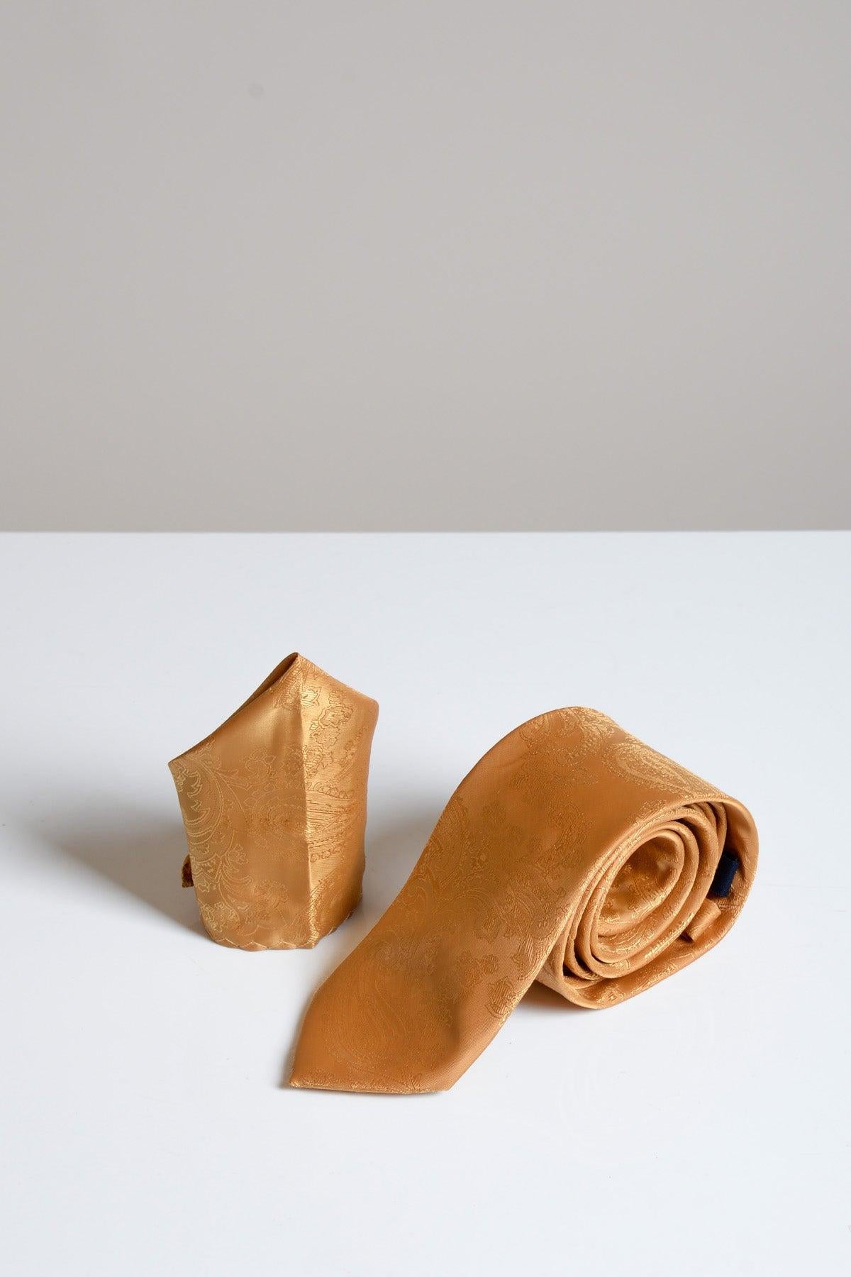 The Accessory MD PAISLEY Gold Paisley Tie and Pocket Square Set is displayed on a white surface with a light gray background.