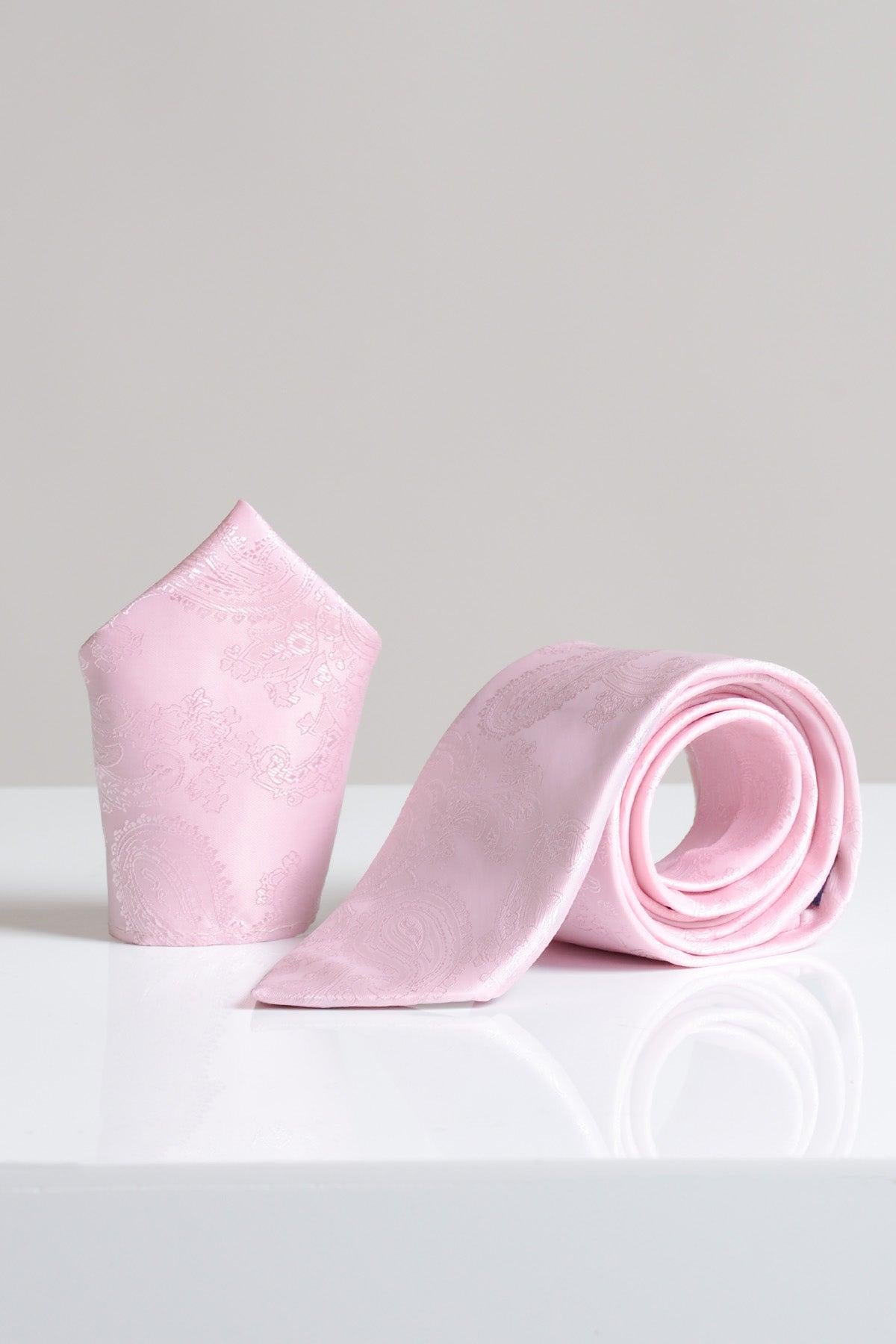 The Accessory MD PAISLEY Light Pink Paisley Tie and Pocket Square Set features a rolled tie beside a matching folded pocket square, both displayed stylishly on a white surface against a neutral background.