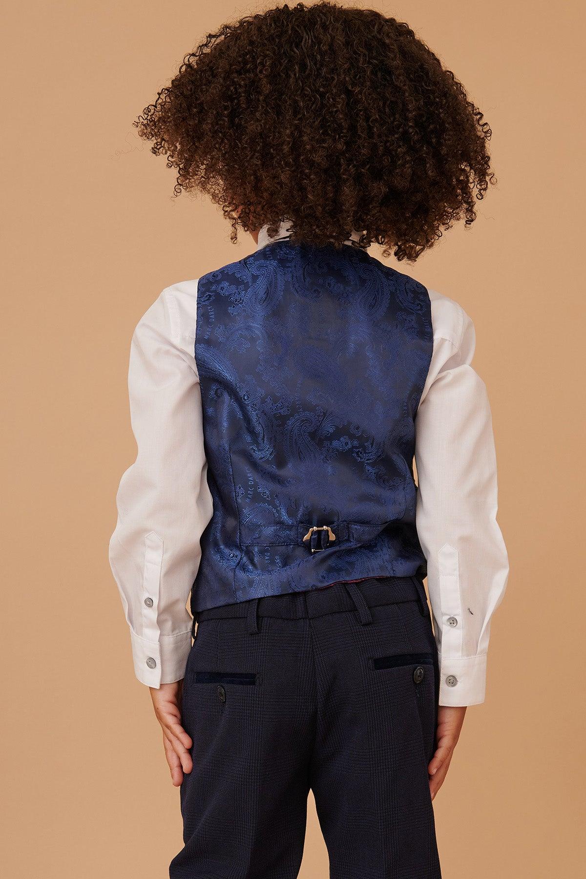 Back view of a boy in the Marc Darcy BROMLEY Children's Navy Check Print Three Piece Suit—a stylish set that can be coordinated with an adult suit for matching family looks.
