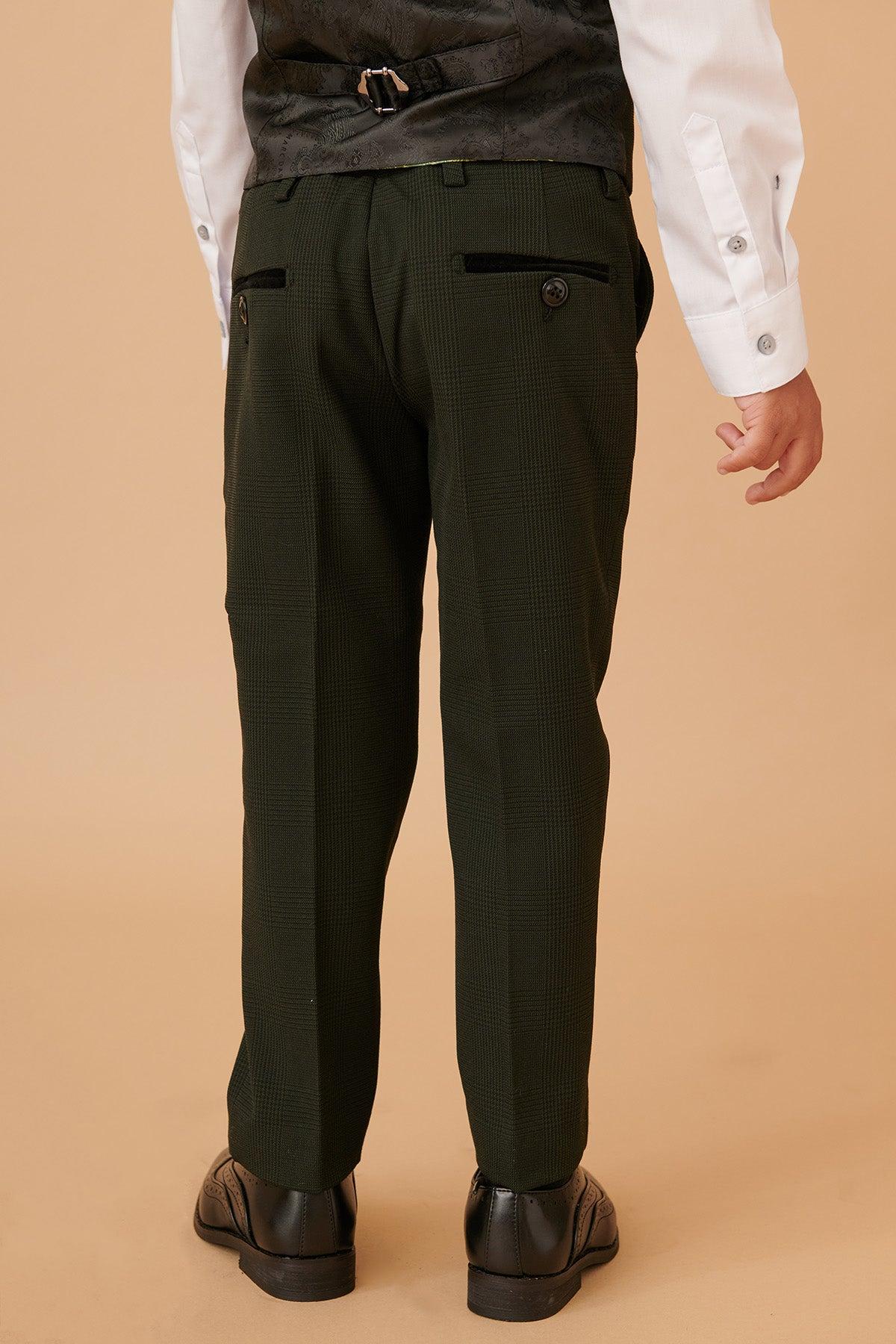 A child models the Marc Darcy BROMLEY Children's Olive Green Check Print Three Piece Suit, standing with their back to the camera and hands relaxed by their sides against a plain beige background.