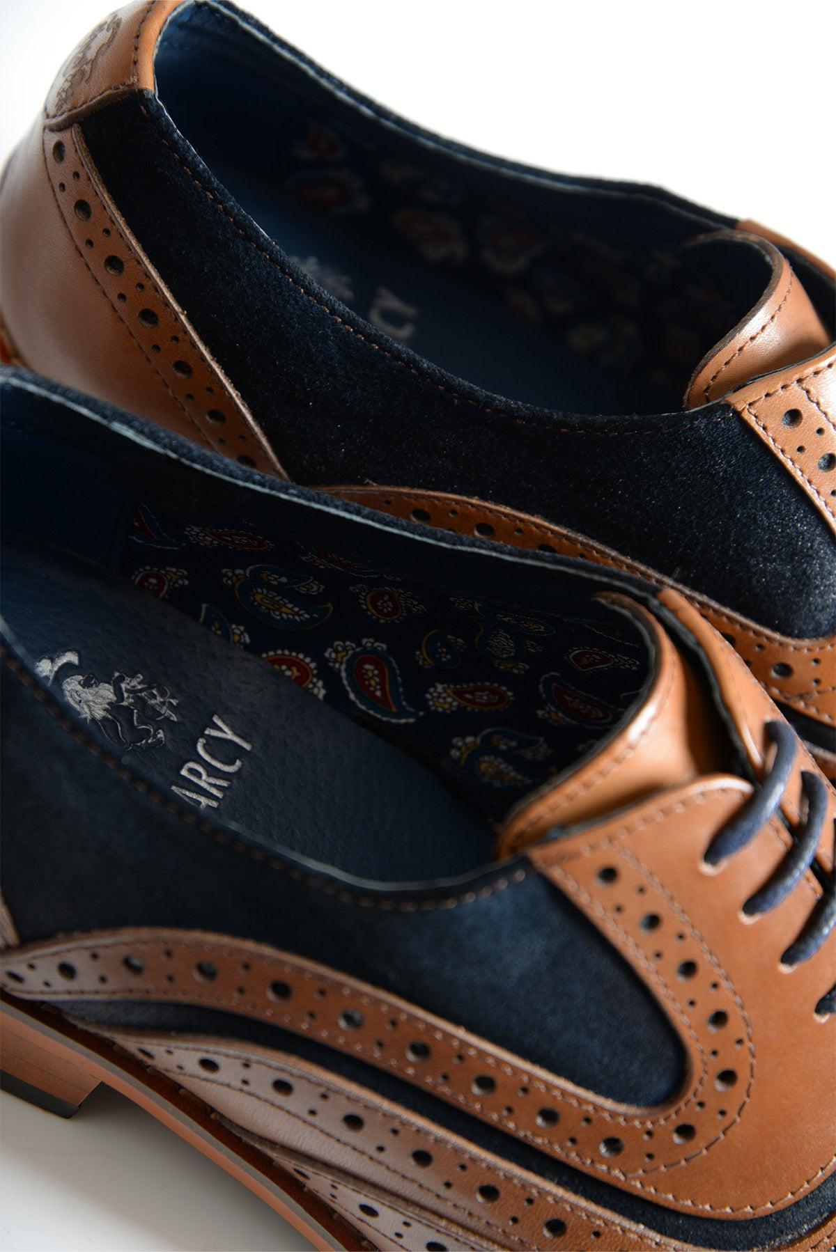 A close-up of the Marc Darcy MURRAY - Contrast Tan Leather Suede Brogue Shoe, featuring full grain leather, black and brown contrast, perforated details, and a decorative patterned lining.