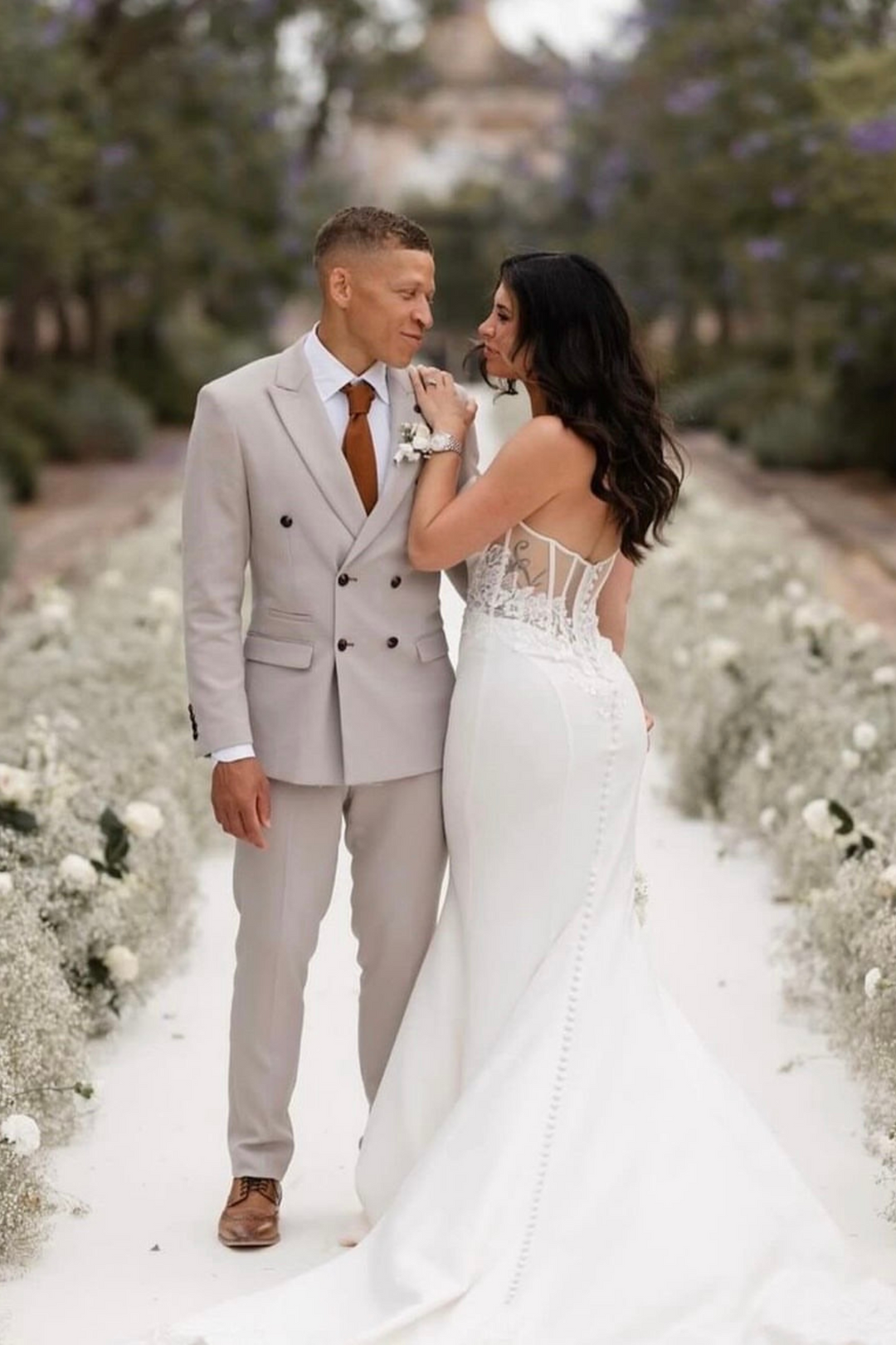 Footballer Dwight Gayle in HM5 Stone Double-Breasted Suit on his wedding day