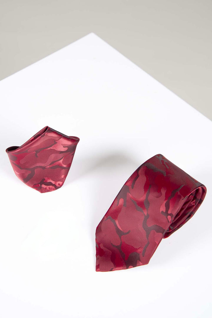 The Accessory TS ARMY Wine Camouflage Tie and Pocket Square Set features a red camo print, stylishly displayed on a white surface with a light gray background—ideal for adding flair to your formal attire.