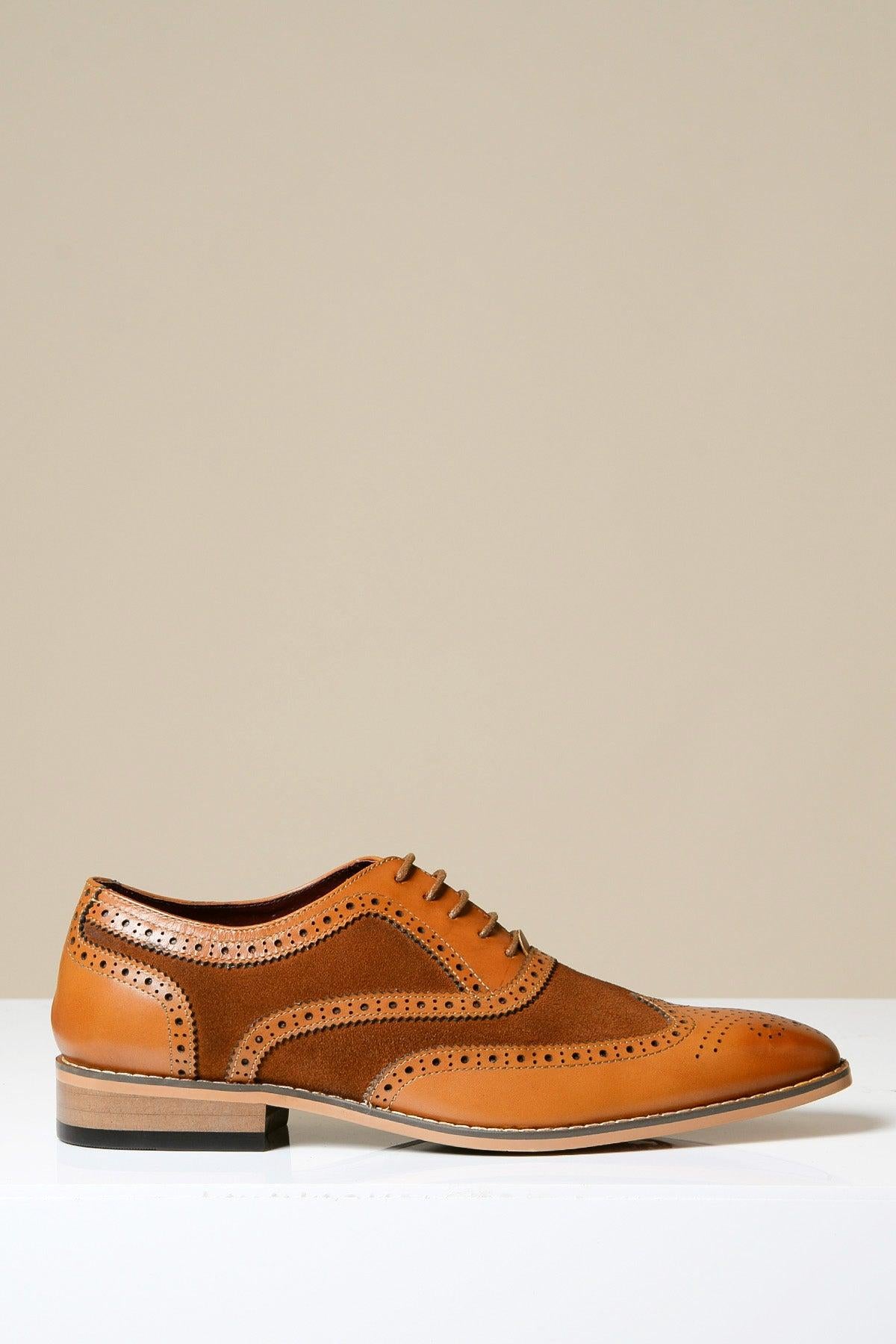 The Marc Darcy BRADLEY Tan Leather Suede Contrast Brogue Shoe is a men's wingtip oxford with classic brogue details and a stacked heel, crafted from full grain leather and suede, shown on a plain light beige background.