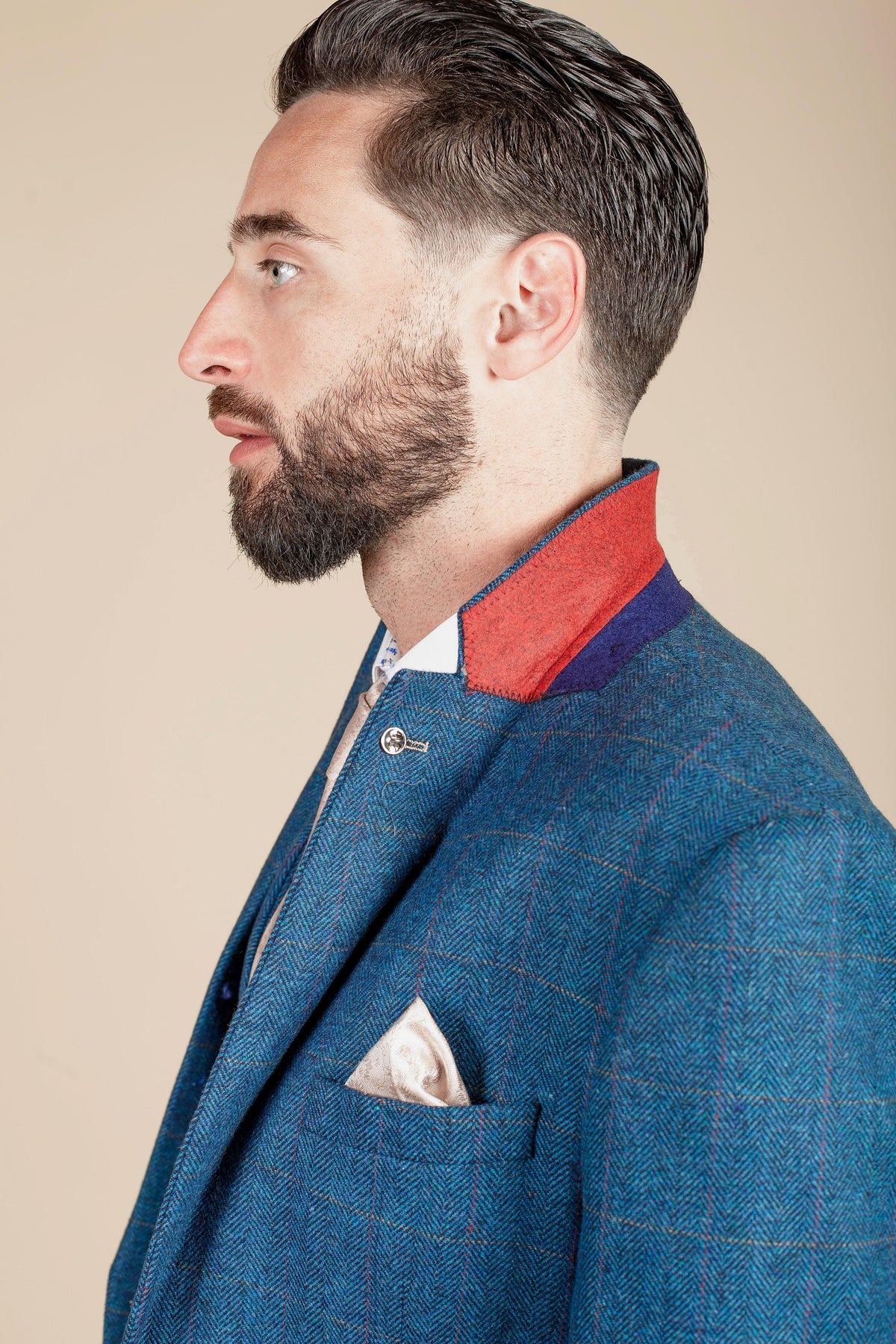 Jarrad Branthwaite in the marcdarcy The Everton Collection DION Blue Tweed Check Suit, featuring red and blue lapel details and a silk pocket square.
