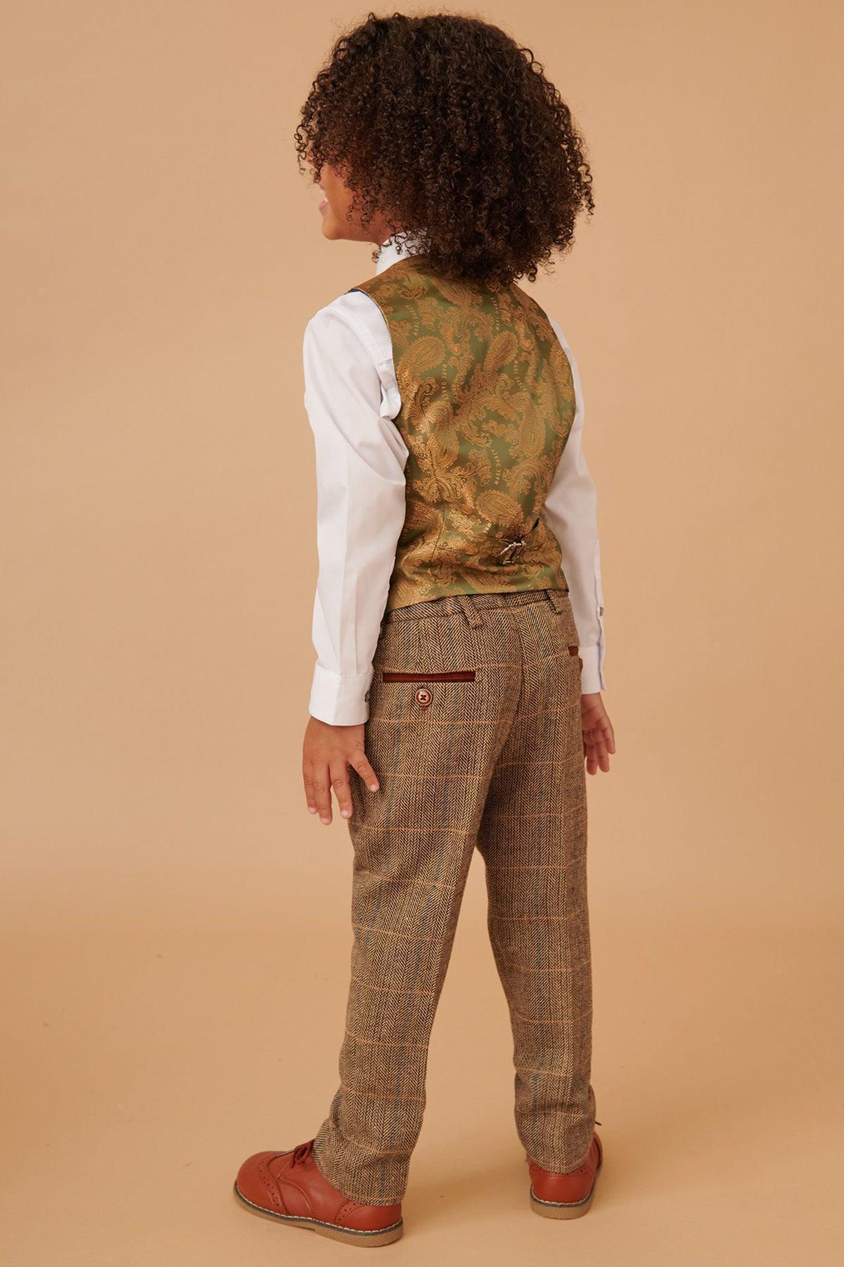 A boy in the marcdarcy TED Children's Tan Tweed Check Three Piece Suit—perfect for a country wedding outfit.