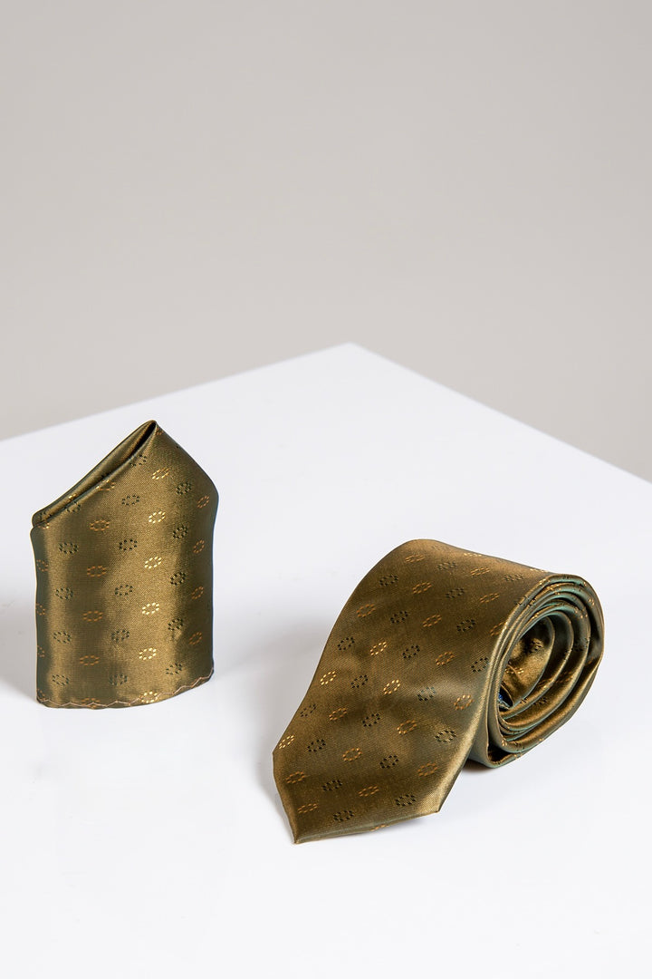 The Accessory TS CIRCLE - Gold Circle Tie and Pocket Square Set features an olive green pocket square and a matching tie with a gold circle pattern, ideal for enhancing your tux, shown on a white surface against a neutral backdrop.