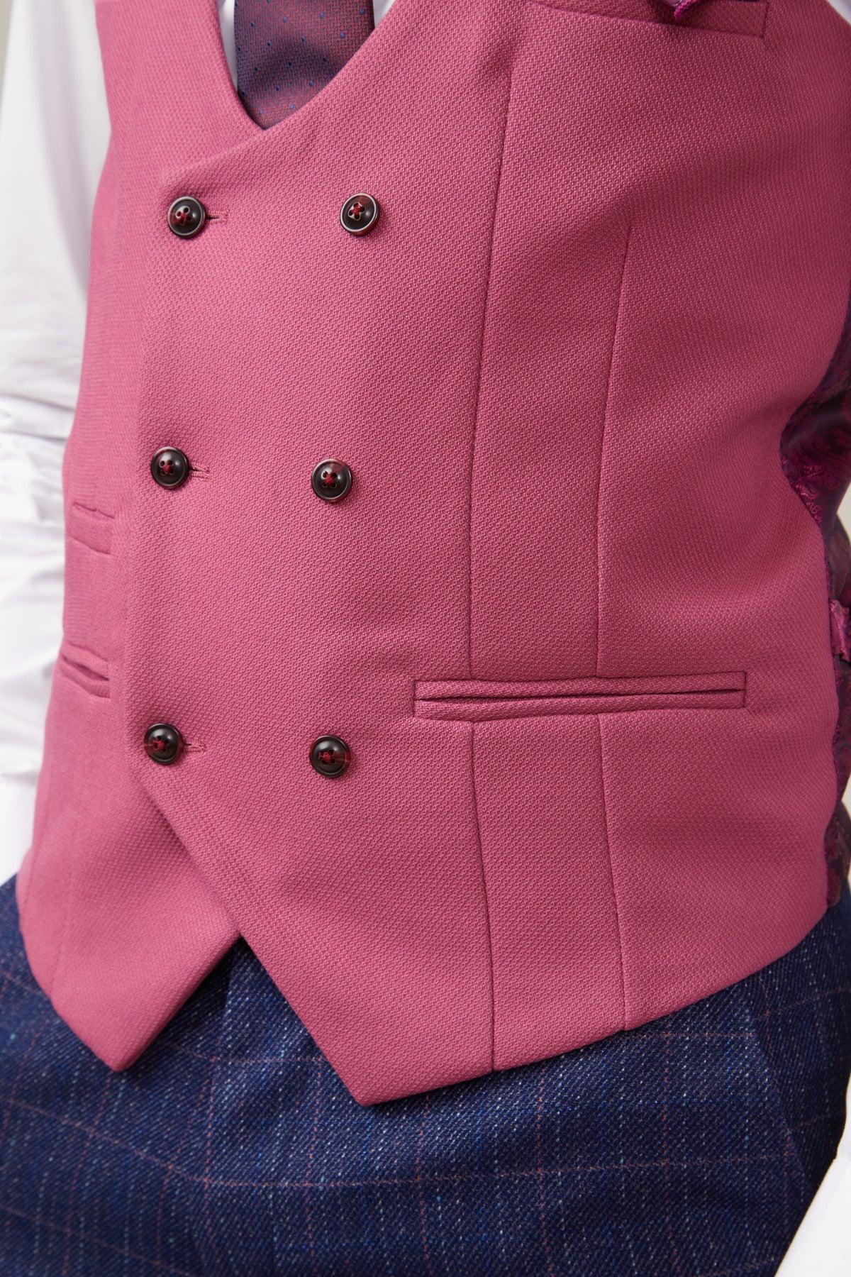 A close-up of a person wearing the marcdarcy KELVIN Berry Double Breasted Waistcoat with black buttons over a white shirt and dark tie, paired with blue checked trousers.
