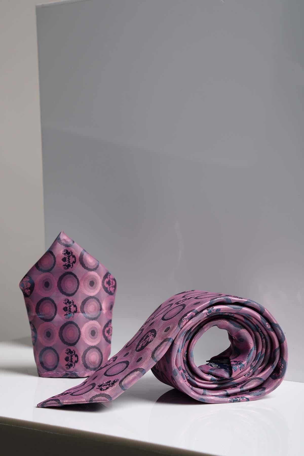 The Marc Darcy BUBBLES - Baby Pink Bubble Circle Print Tie and Pocket Square Set features a bubble circle design with floral accents, both displayed rolled together on a light gray background.
