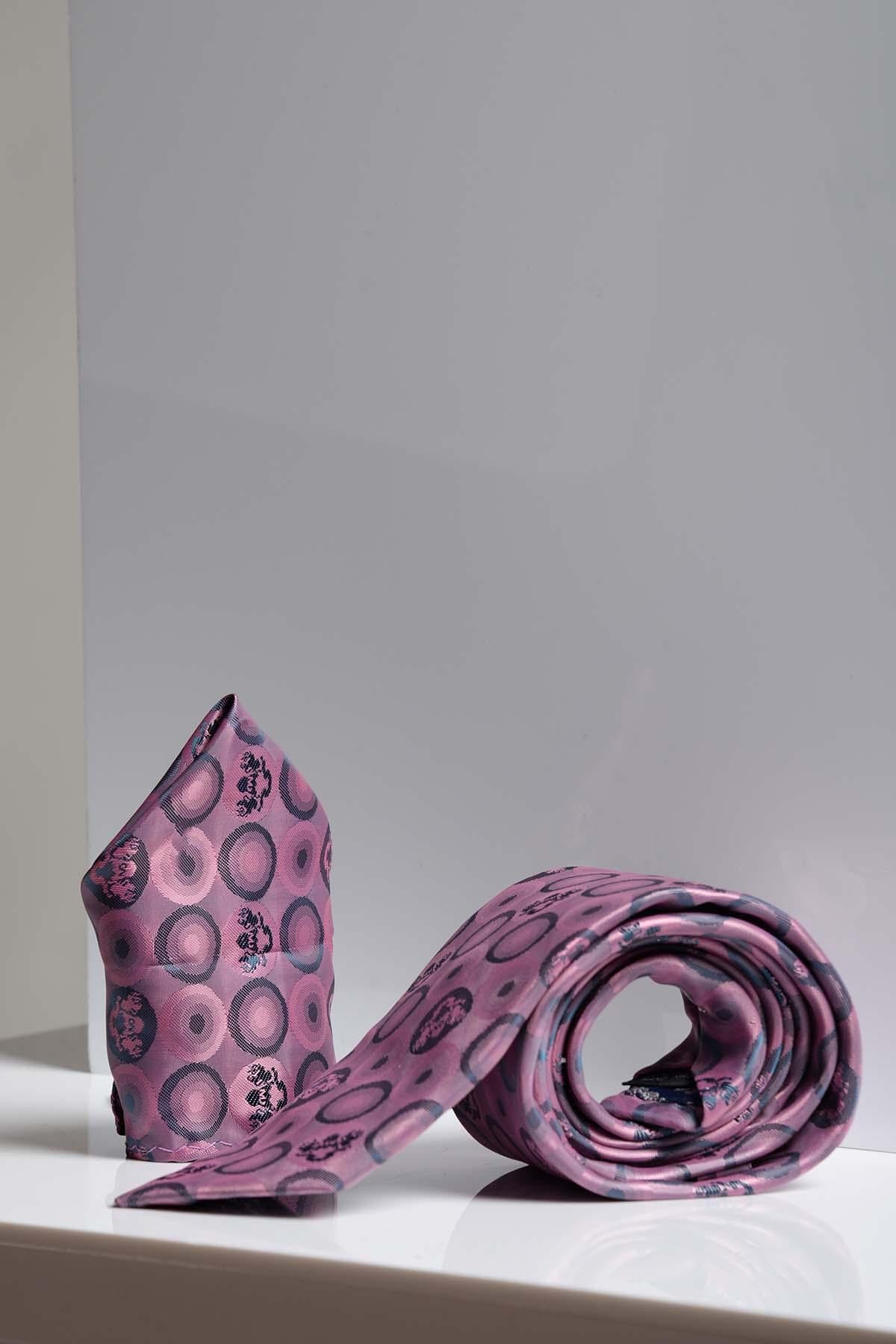 The Marc Darcy BUBBLES set, featuring a baby pink bubble circle print tie and matching pocket square, is displayed on a white surface against a light gray background.