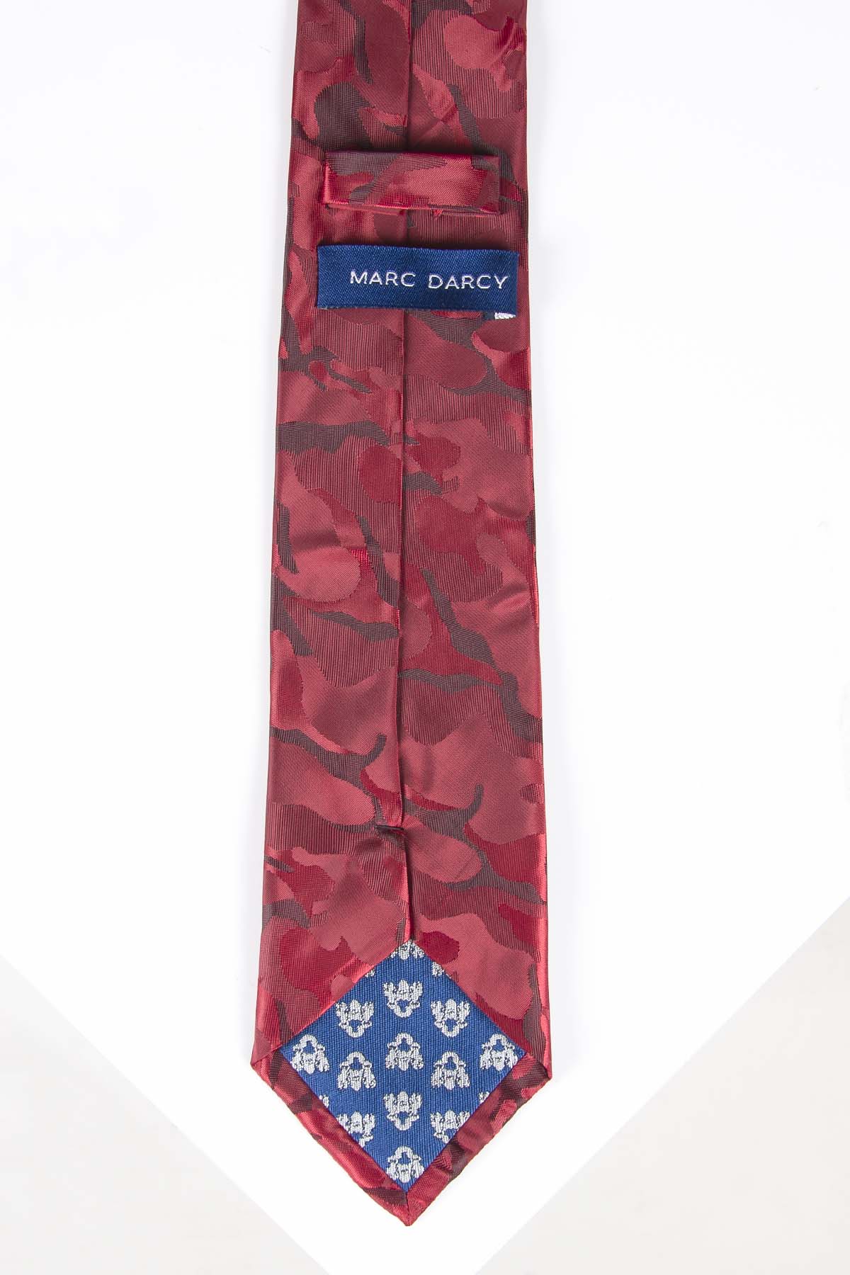 The TS ARMY - Wine Camouflage Tie and Pocket Square Set by Accessory features a unique red camo pattern. The reverse side has a blue tip with a white floral design and MARC DARCY branding—an ideal addition to any accessory collection.