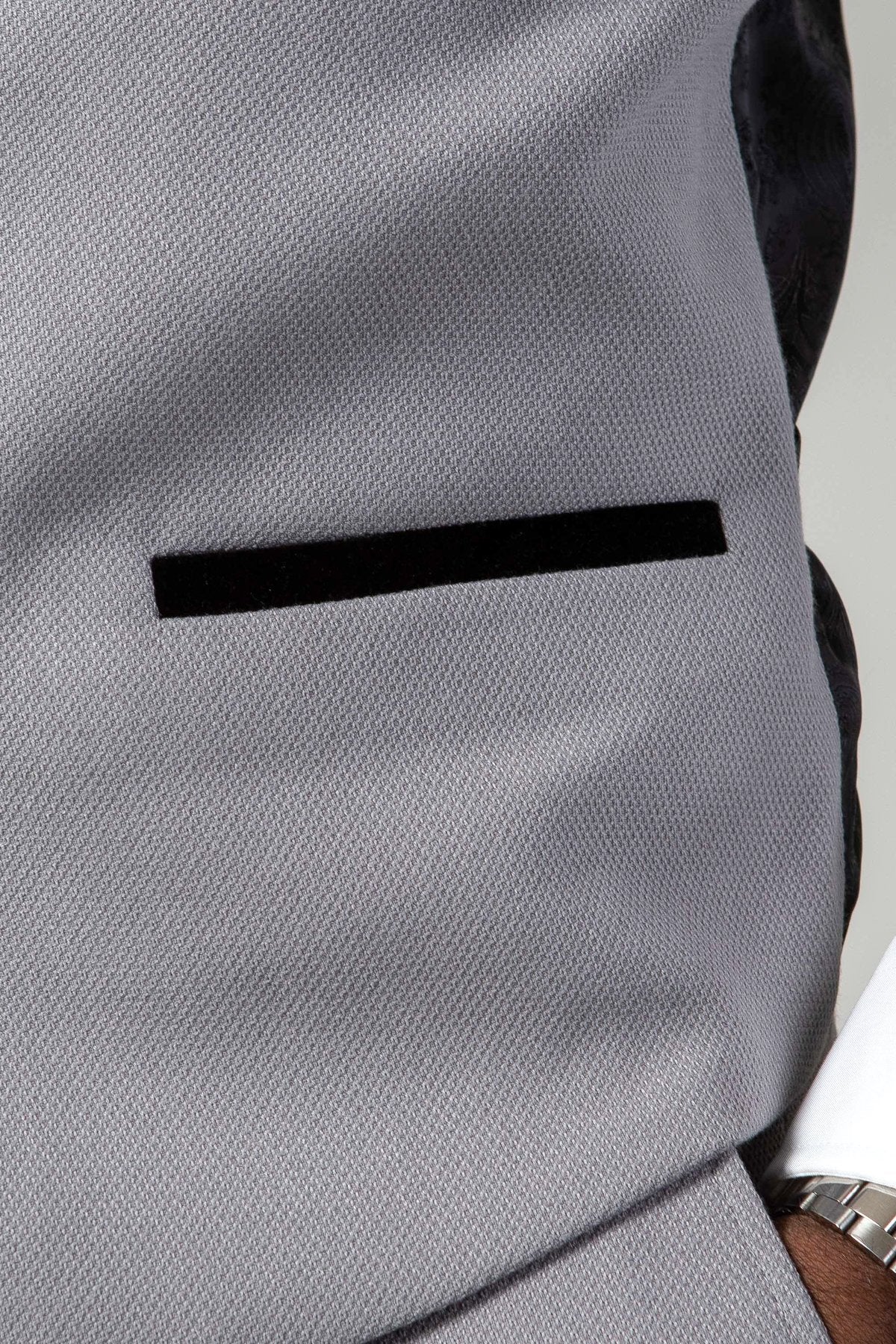 Close-up of the marcdarcy EDWIN Silver Grey Notch Lapel Three Piece Suit, highlighting the black velvet trim pocket and slim fit details.