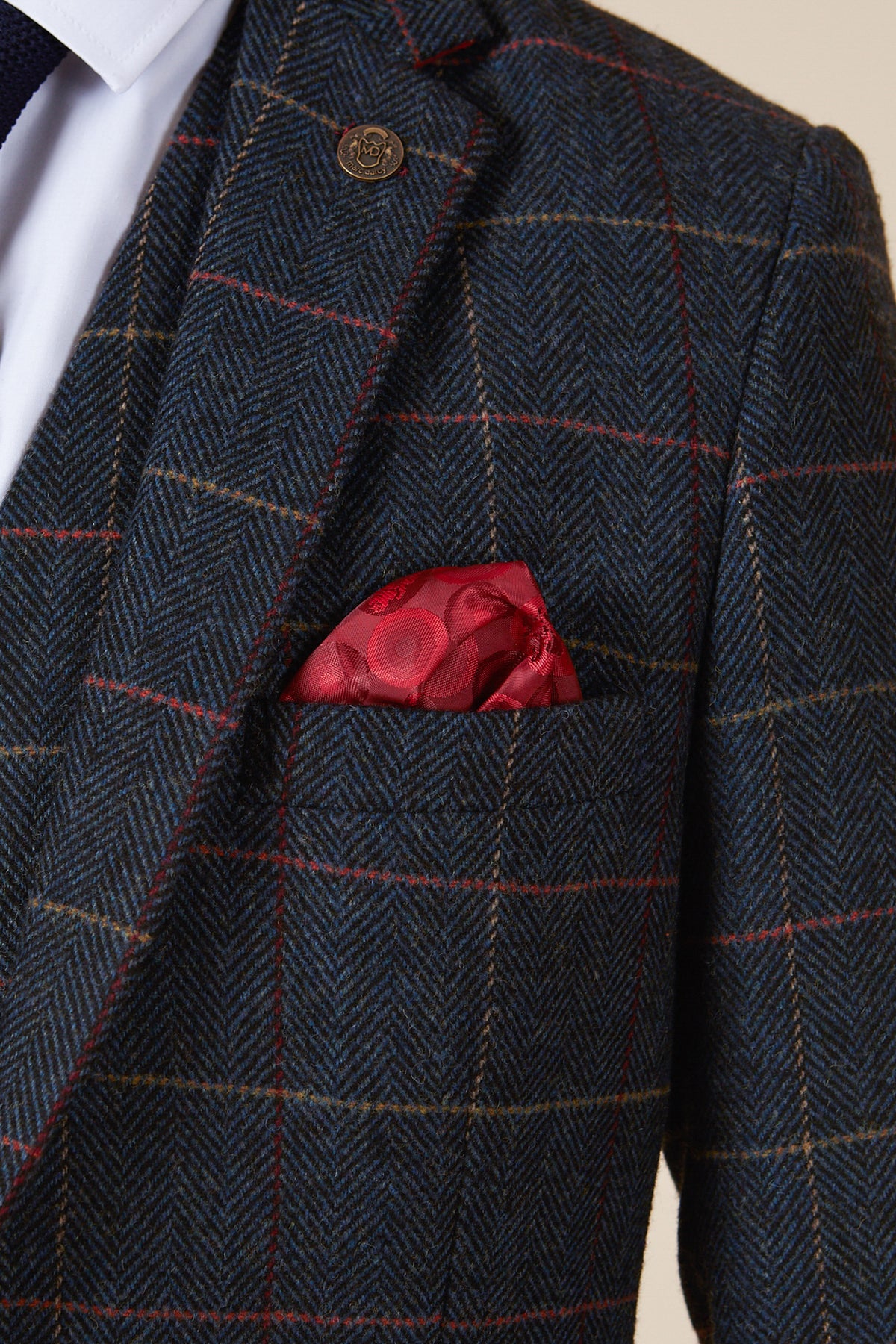 Close-up of the marcdarcy ETON Navy Blue Tweed Check Blazer, styled smart casual with a vibrant red pocket square.
