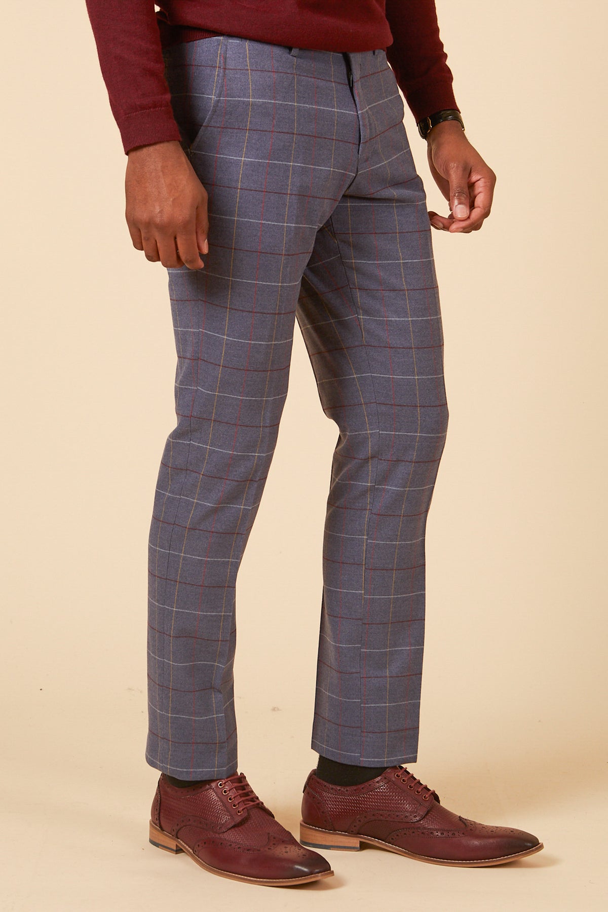 A man steps out in the marcdarcy DRAKE Sky Blue Check Three Piece Suit, offering a sharp formal look that rivals any classic slim fit ensemble.