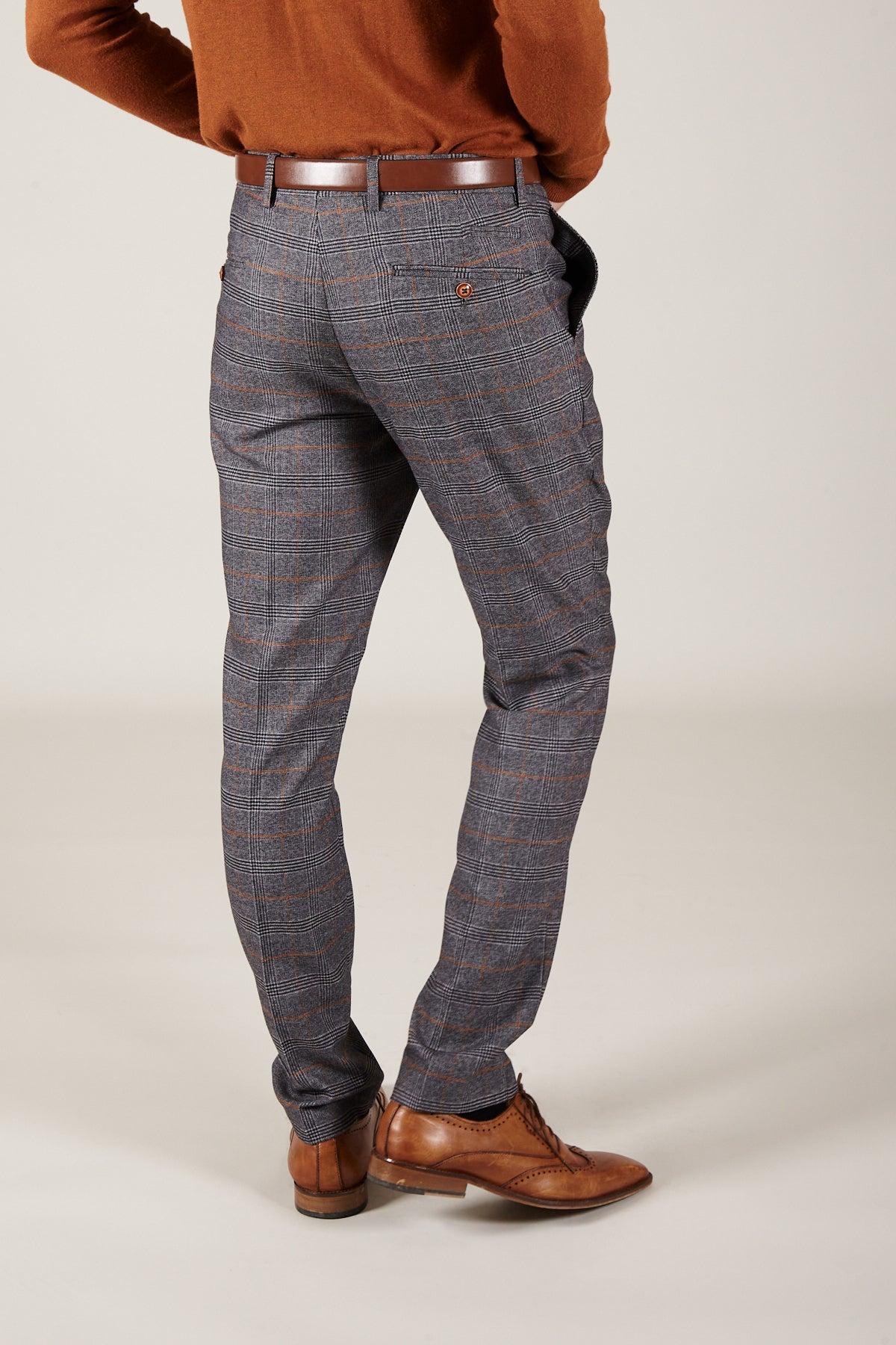 A person is shown from the back wearing MARCDARCY’s JENSON Grey Check Suit with a KELVIN Tan Waistcoat, standing on a plain light background.