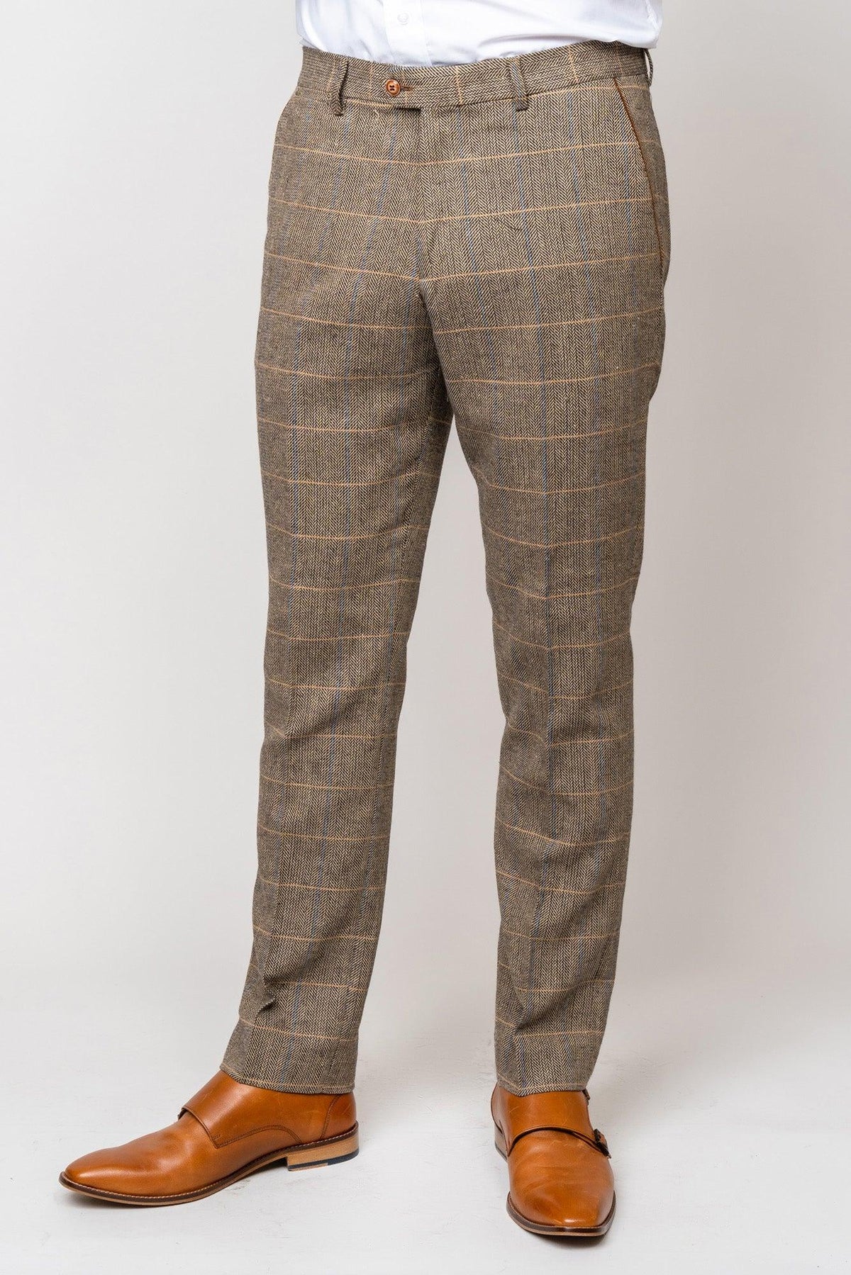 A person wearing the marcdarcy TED - Tan Tweed Check Suit with Kelvin Tan Waistcoat, styled for a country barn wedding, shown from the waist down against a plain white background.
