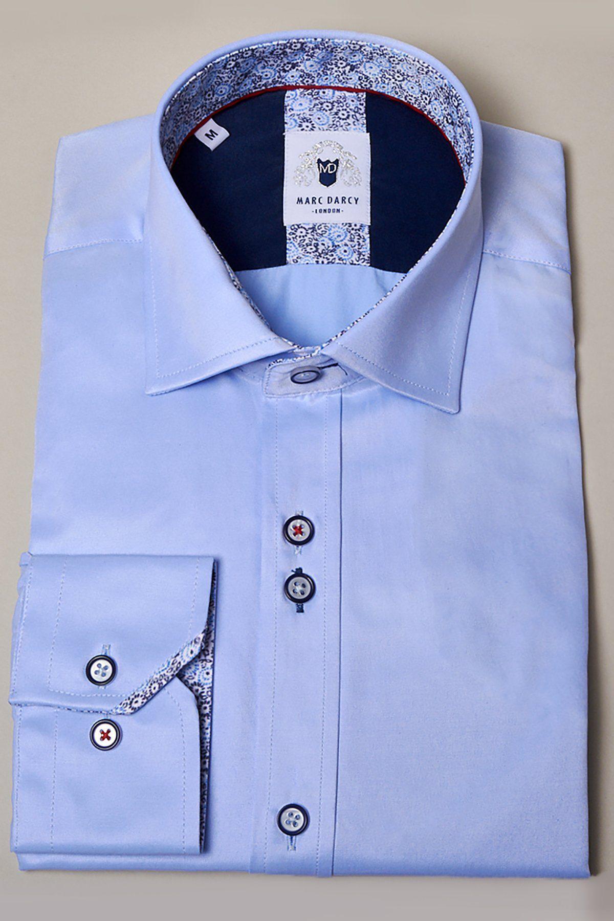 The ALFIE Sky Blue Long Sleeve Shirt by Marc Darcy, made from a cotton blend, features a patterned collar and cuffs with stylish buttons—ideal for smart office wear.