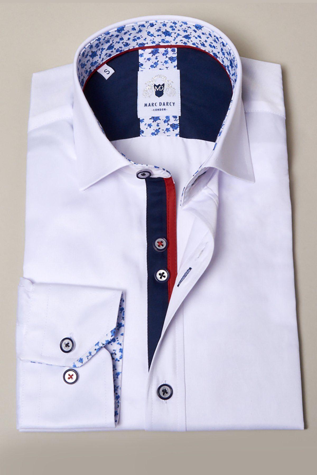 The ALFIE White Long Sleeve Shirt by Marc Darcy features a cotton blend with navy and red trim on the placket, plus blue floral detail on the inner collar and cuffs.