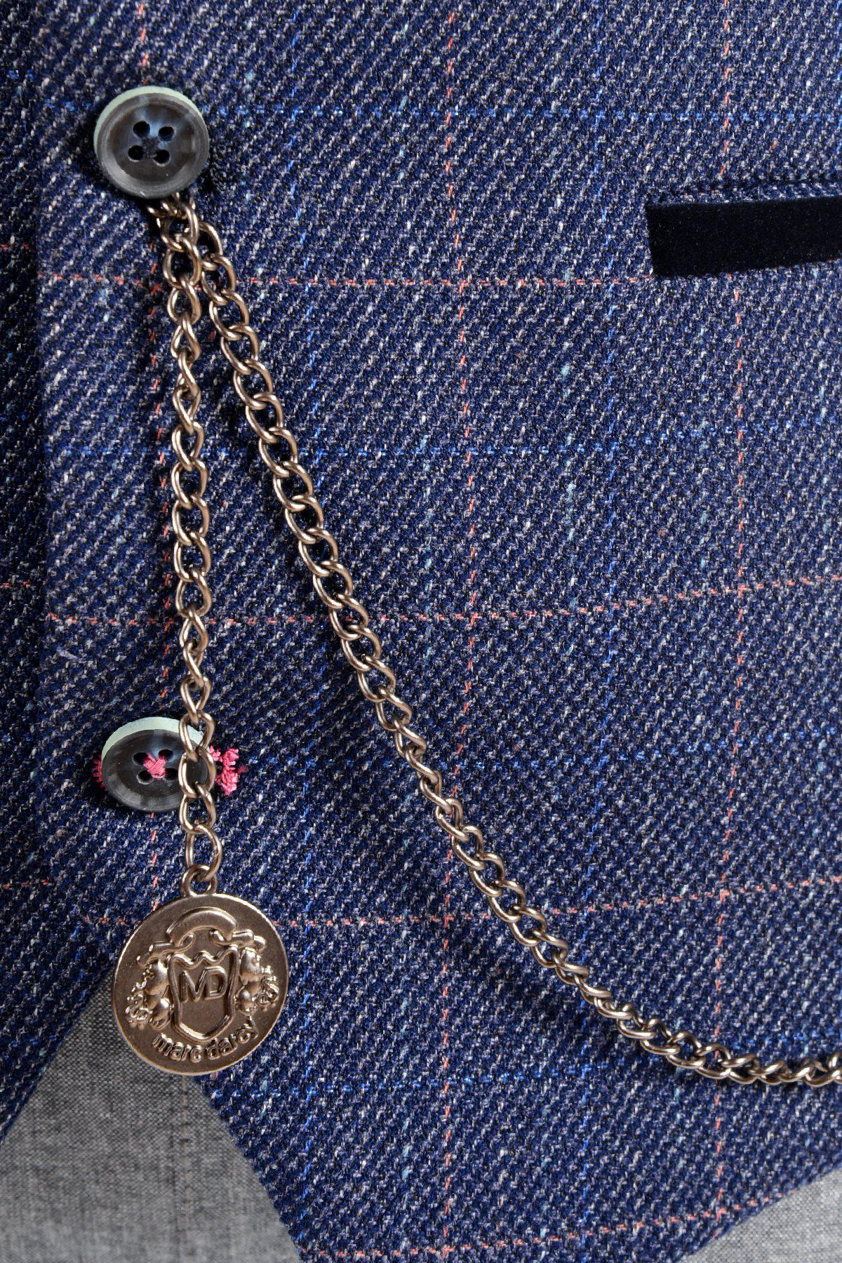 Close-up of the Marc Darcy Antique Style Silver Plated T-Bar Waistcoat Chain, featuring a crest-engraved round medallion with MD initials, attached to a blue plaid jacket. Includes a velvet keepsafe pouch.