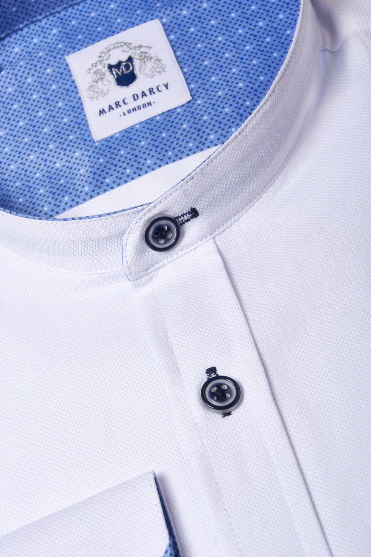 Close-up of the ARCHIE white grandad collar shirt by Marc Darcy, featuring navy buttons.