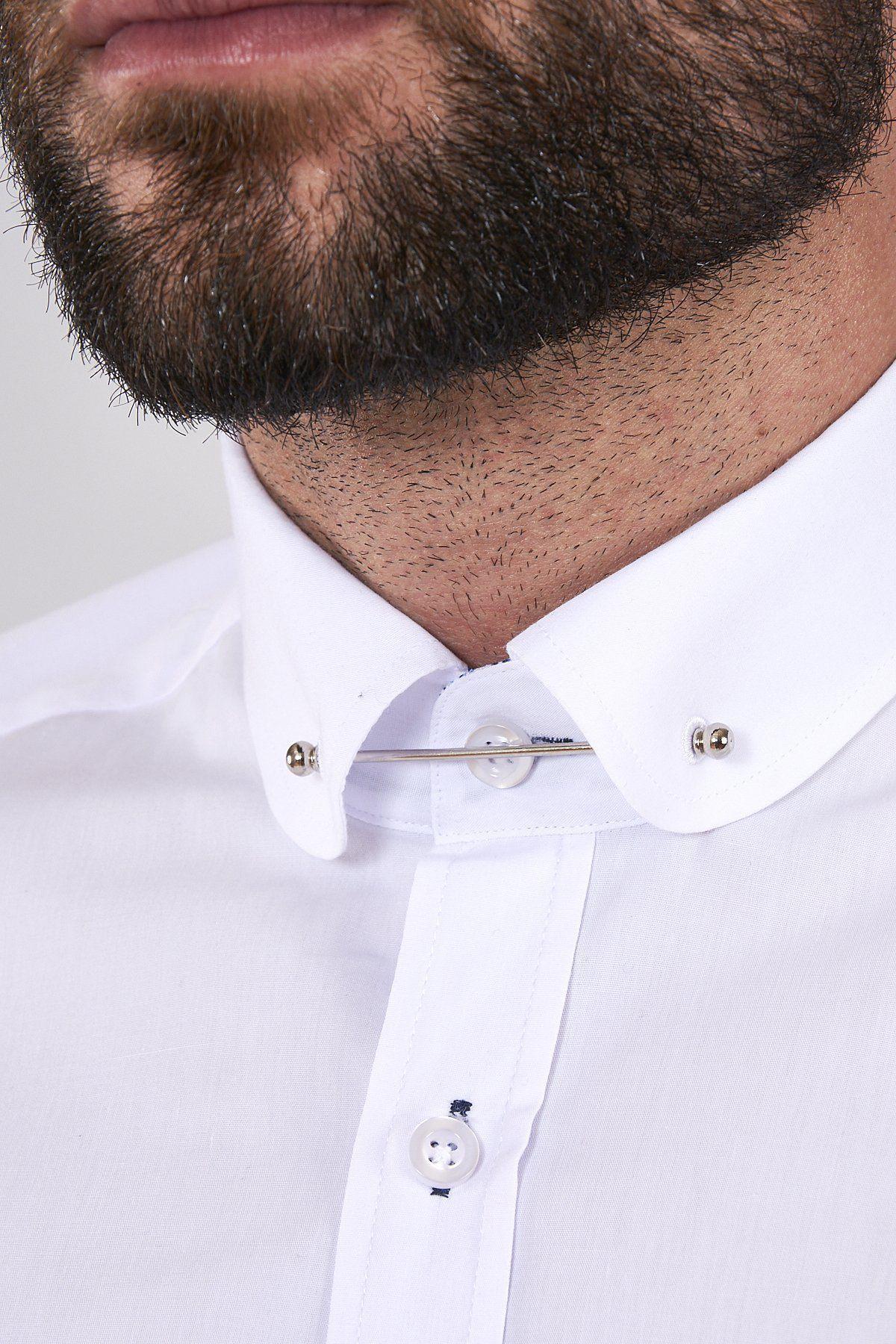 Close-up of a man's lower face and neck wearing the marcdarcy BENSON White Penny Collar Shirt with a silver collar bar. His neatly trimmed beard highlights this classic formalwear style.