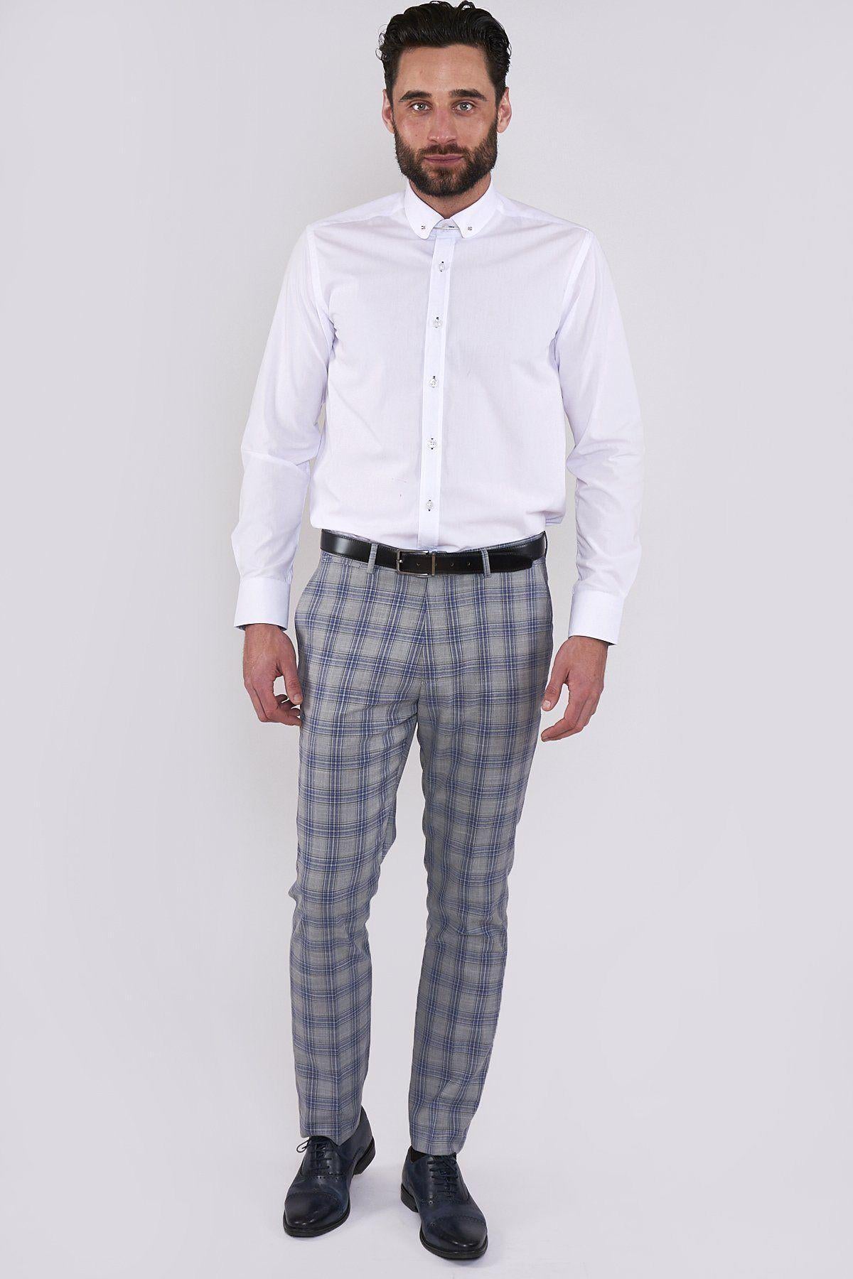 A man with a beard wears the marcdarcy BENSON White Penny Collar Shirt with Collar Bar, paired with gray plaid trousers, black belt, and black dress shoes. He stands facing forward against a plain light background, dressed for formal occasions.