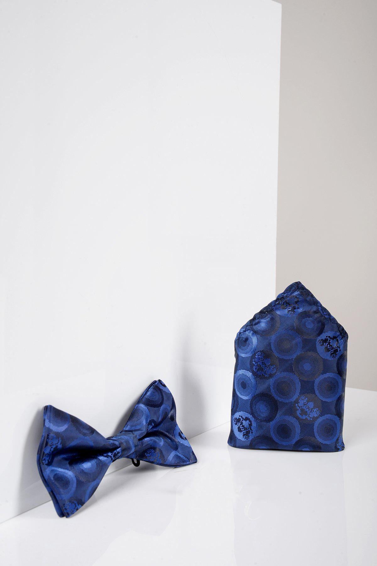 The Marc Darcy BUBBLES Navy Bubble Circle Print Bow Tie and Pocket Square Set offers a stylish, coordinated look for special occasions.