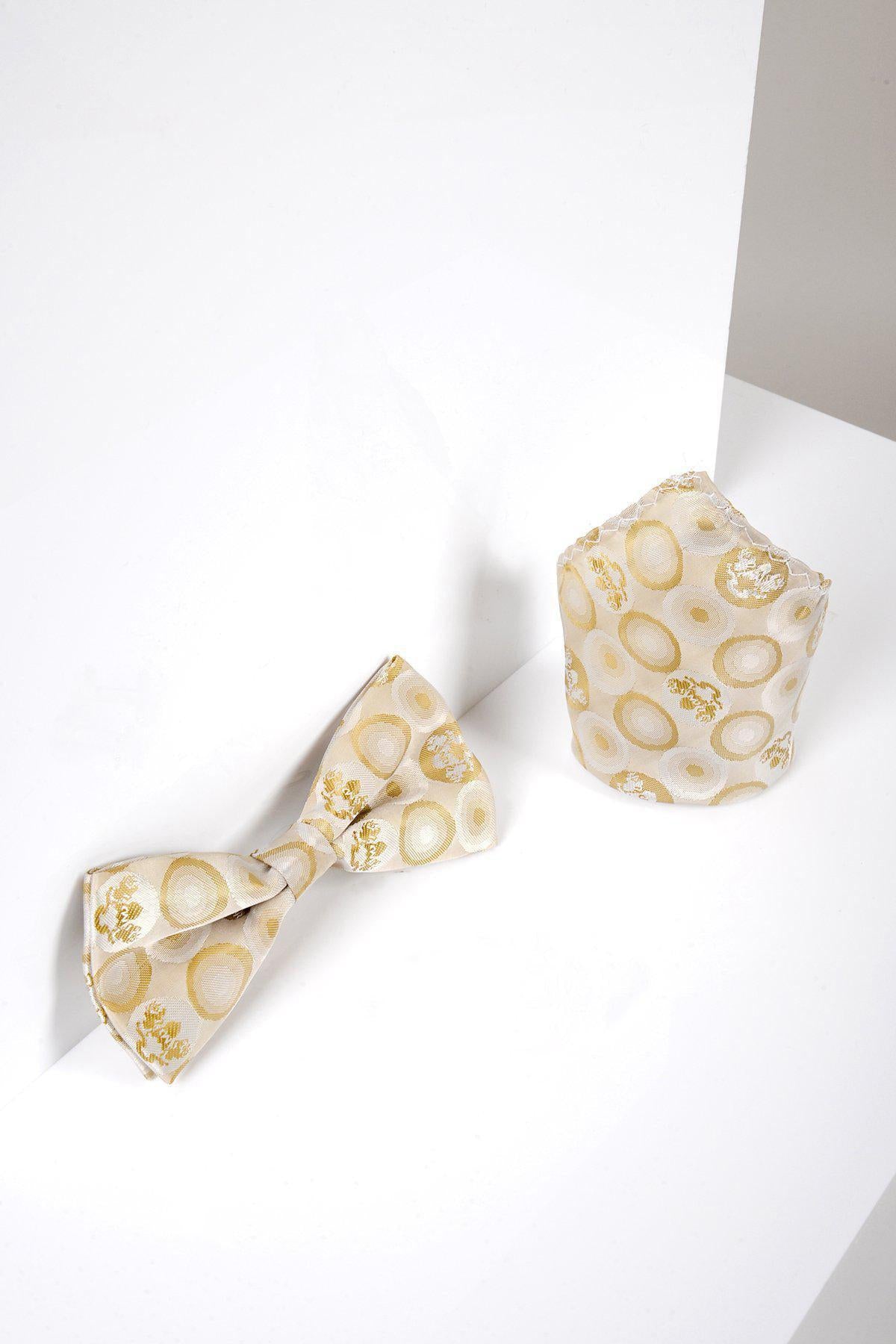 The BUBBLES - Stone Bubble Circle Print Bow Tie and Pocket Square Set by Marc Darcy features gold bubbles and floral designs on white, with a subtle bespoke MD logo print for added elegance.