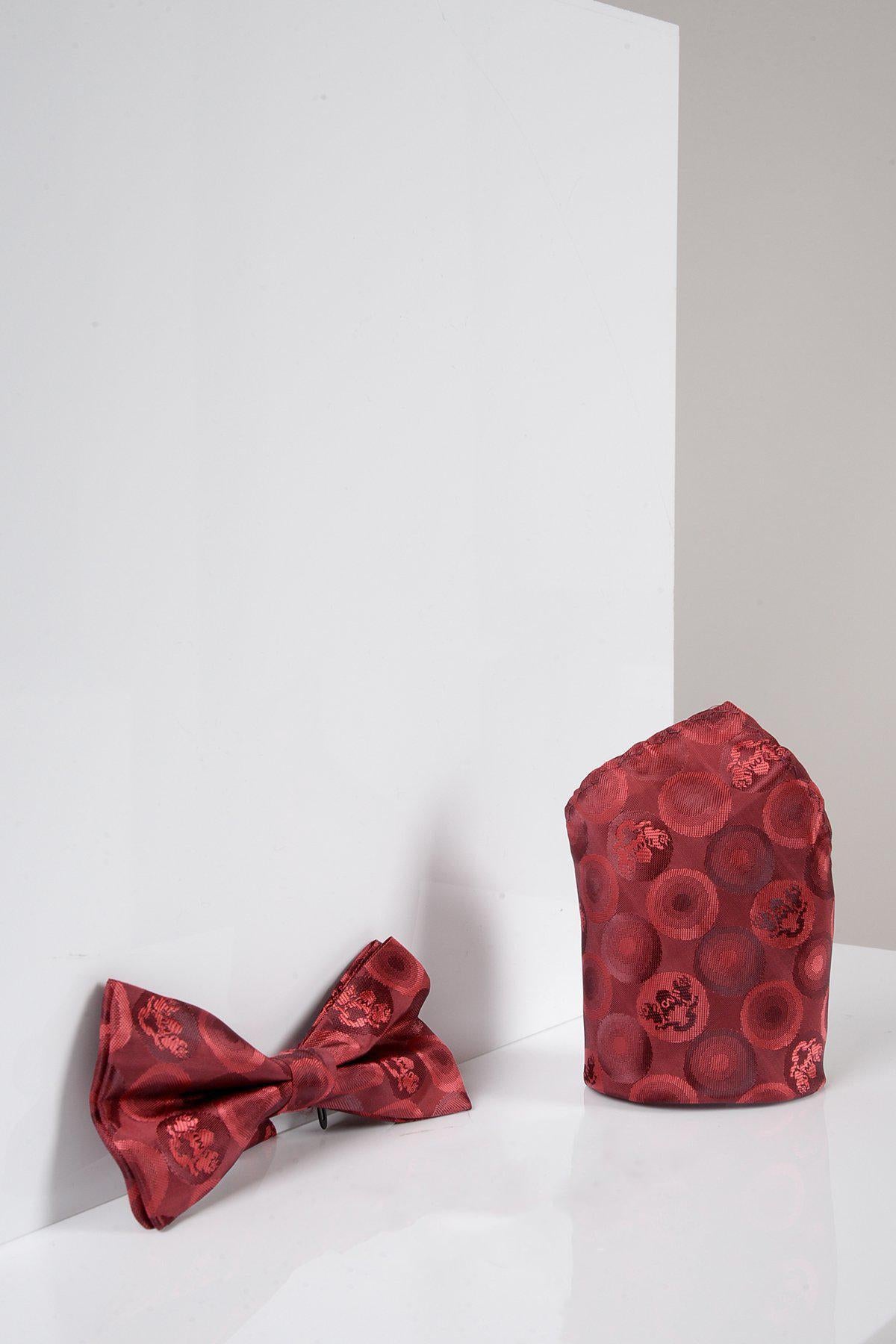 The Marc Darcy BUBBLES Wine Bubble Circle Print Bow Tie and Pocket Square Set is displayed on a shiny white surface with a light grey and white background, ideal for formalwear.