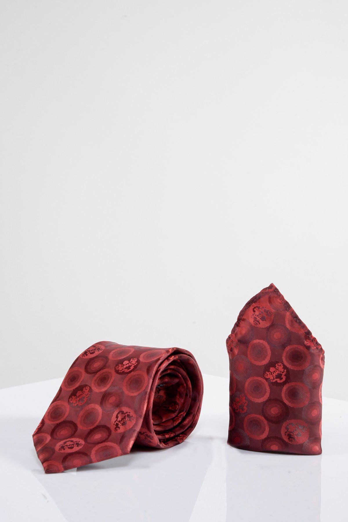 The Marc Darcy BUBBLES - Wine Bubble Circle Print Tie and Pocket Square Set features a wine-colored tie with circular patterns and a matching pocket square, elegantly displayed on a white surface.