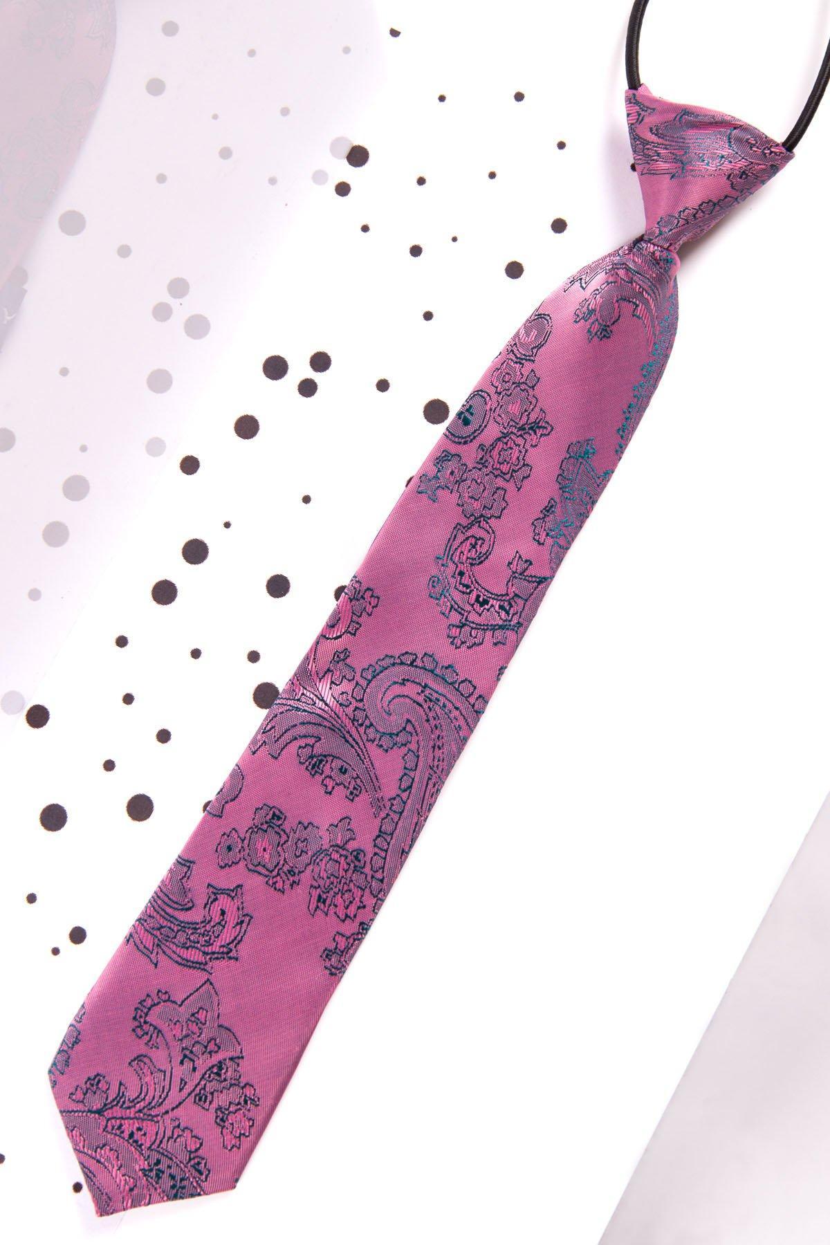 The Marc Darcy Children's Pink Paisley Print Tie, ideal for a boy's three piece suit, features a dark blue paisley pattern and is shown on a white background with scattered dark gray dots.