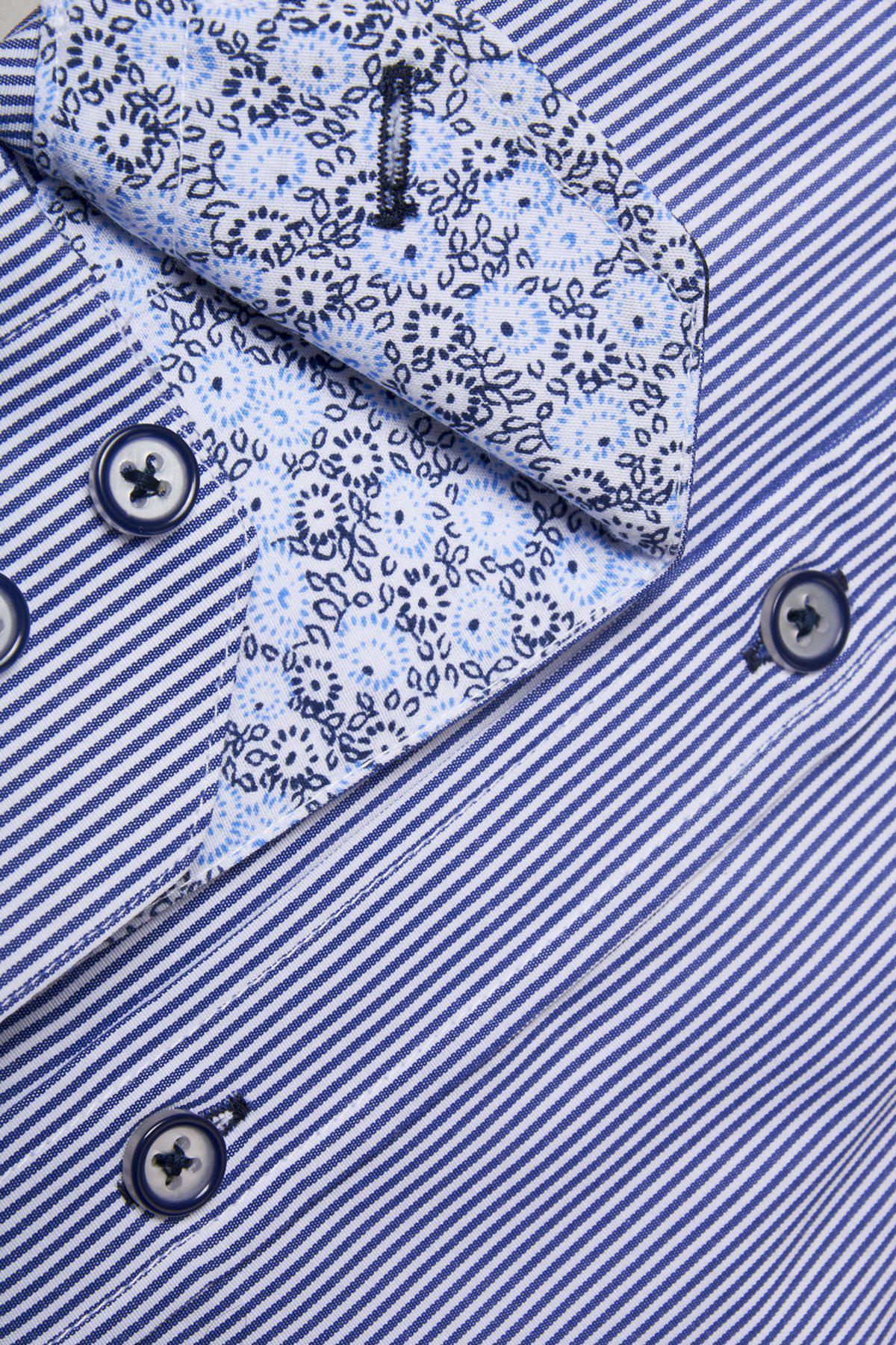 Close-up of the COOPER Grandad Collar Navy Stripe Shirt by Marc Darcy. Features thin blue and white pinstripes, a white grandad collar interior with a dark blue floral print, and blue button accents.