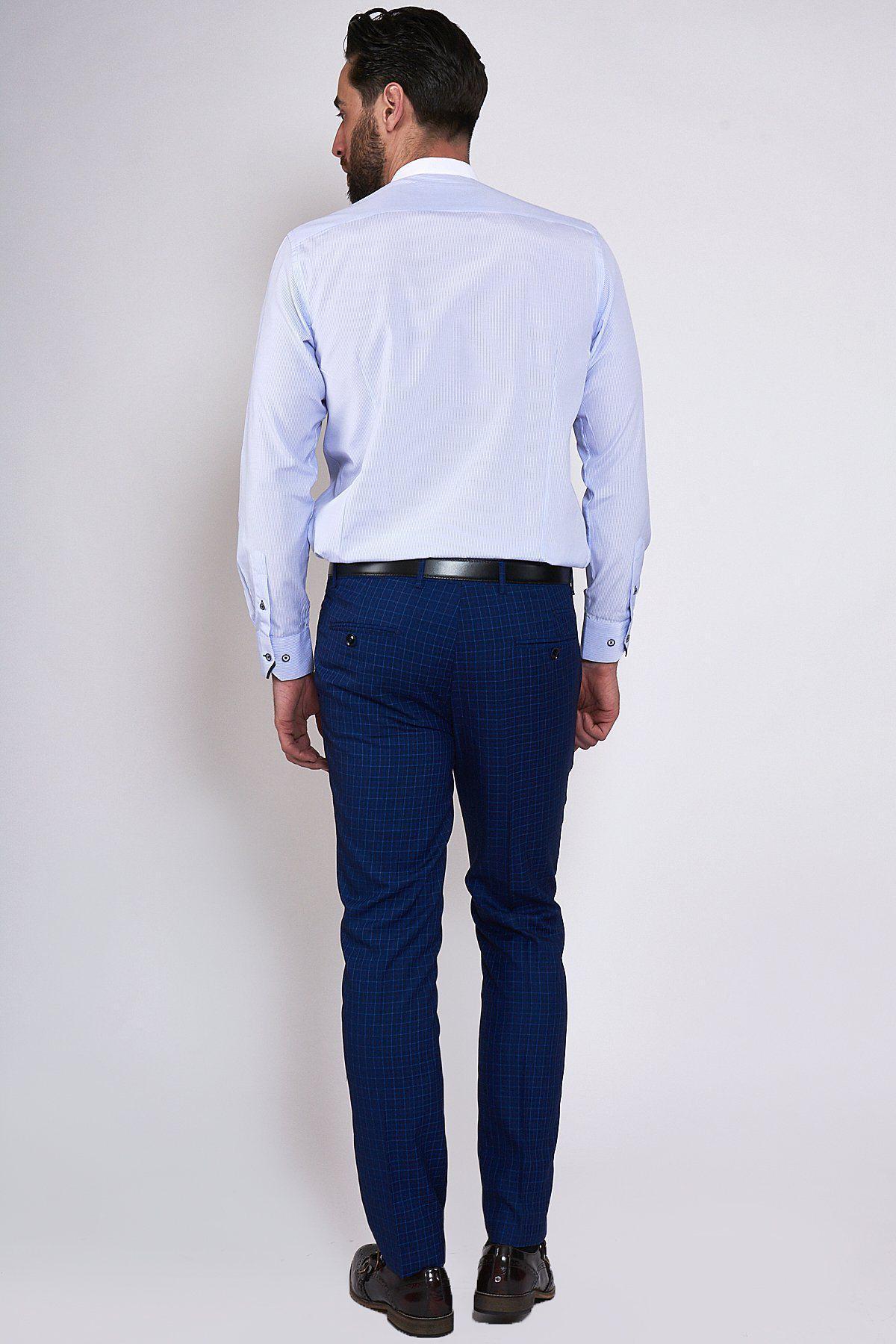 Man in a Marc Darcy COOPER Grandad Collar Sky Blue Stripe Shirt paired with dark blue plaid trousers.