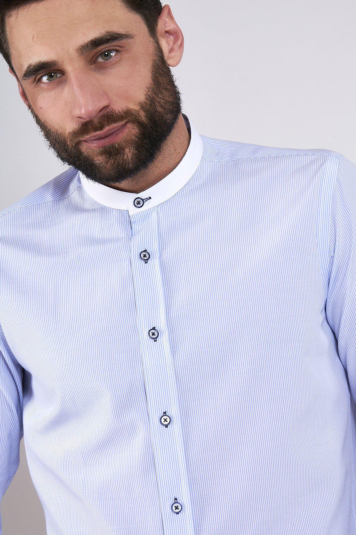 A man with a beard wears the Marc Darcy COOPER Grandad Collar Sky Blue Stripe Shirt, featuring dark buttons, against a plain light background.