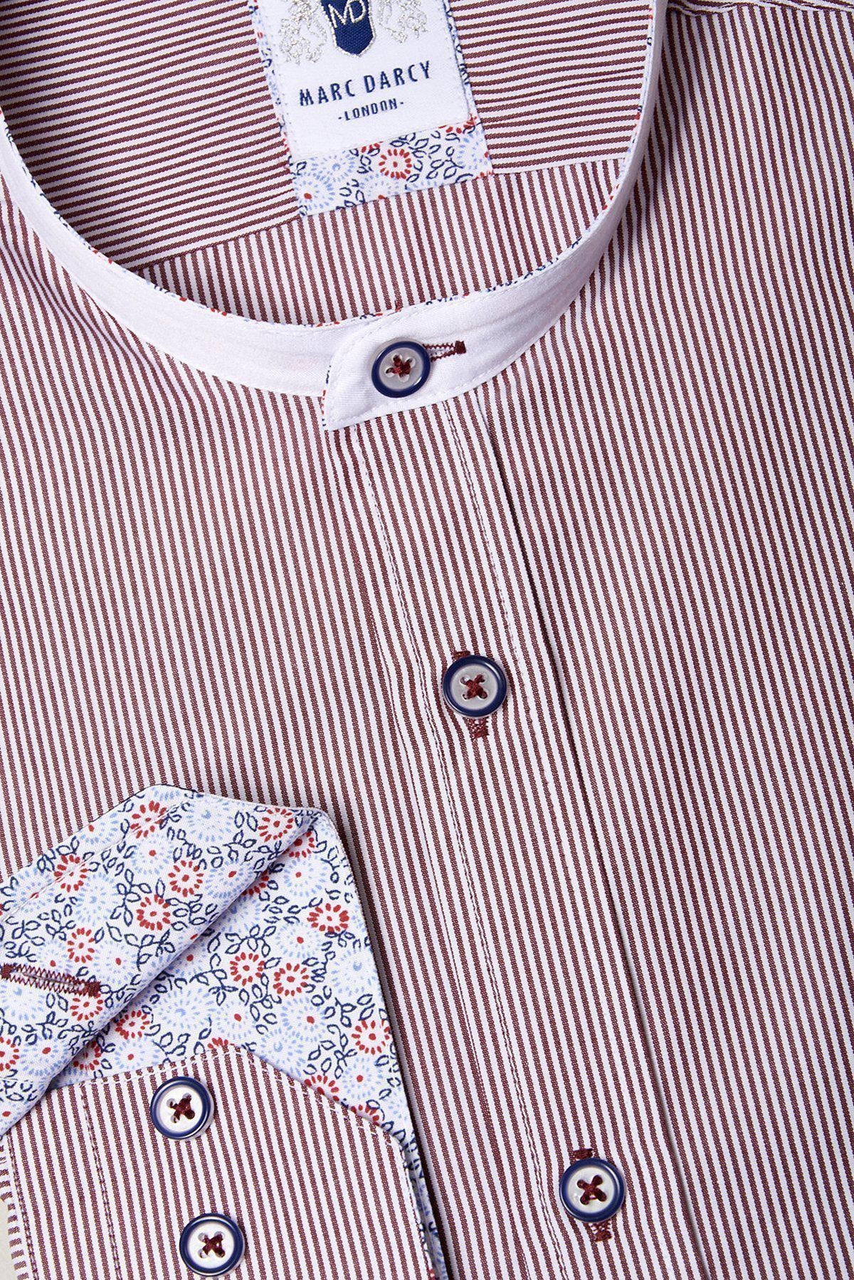 A close-up of the Marc Darcy COOPER Grandad Collar Wine Stripe Shirt shows a classic fit with red and white pinstripes, blue and red buttons, floral inner collar and cuffs, and the Marc Darcy brand label.