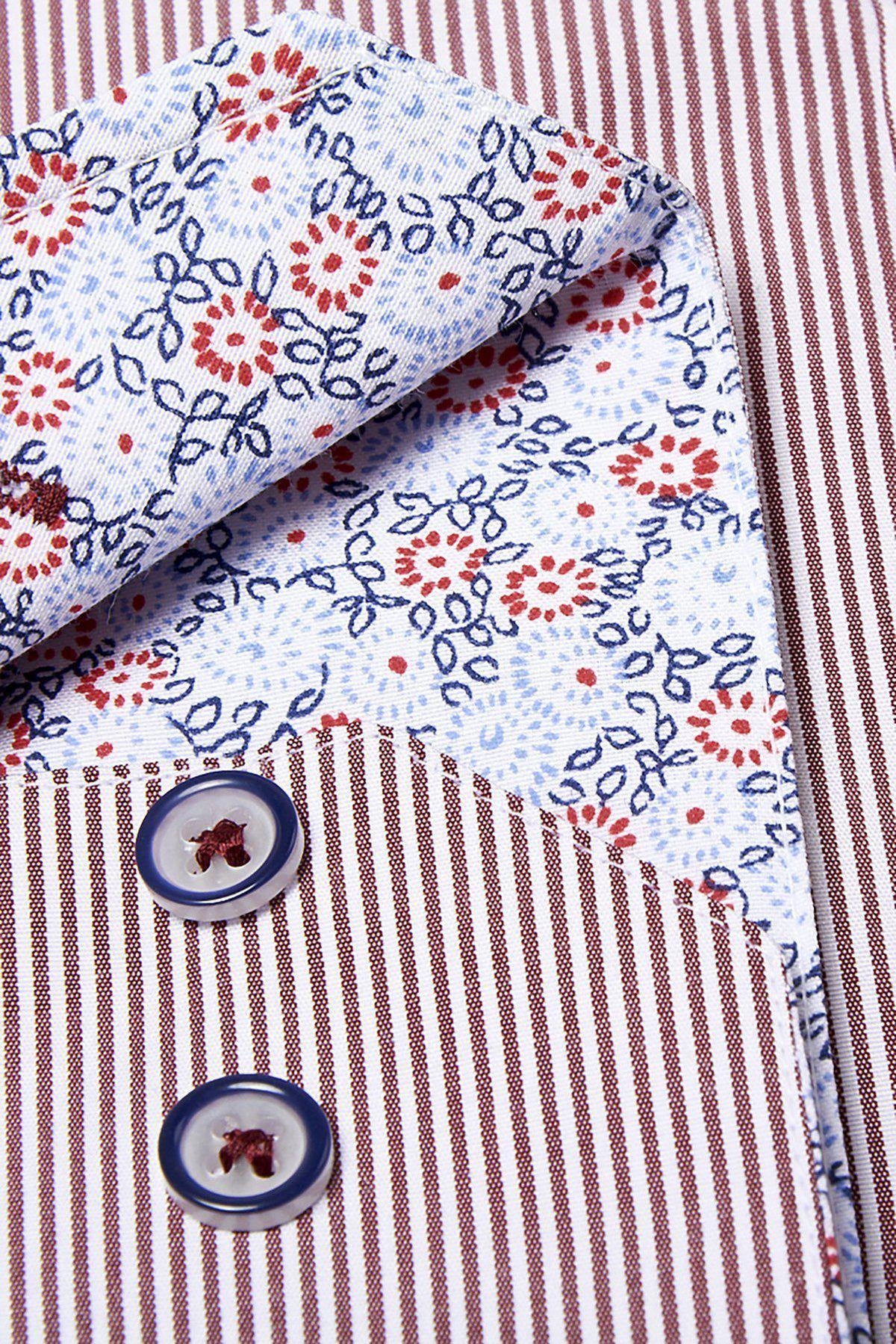 A close-up of the Marc Darcy COOPER Grandad Collar Wine Stripe Shirt reveals vertical maroon and white stripes, a white inner lining with blue and red floral pattern, and two buttons with blue rims for classic vintage detail.