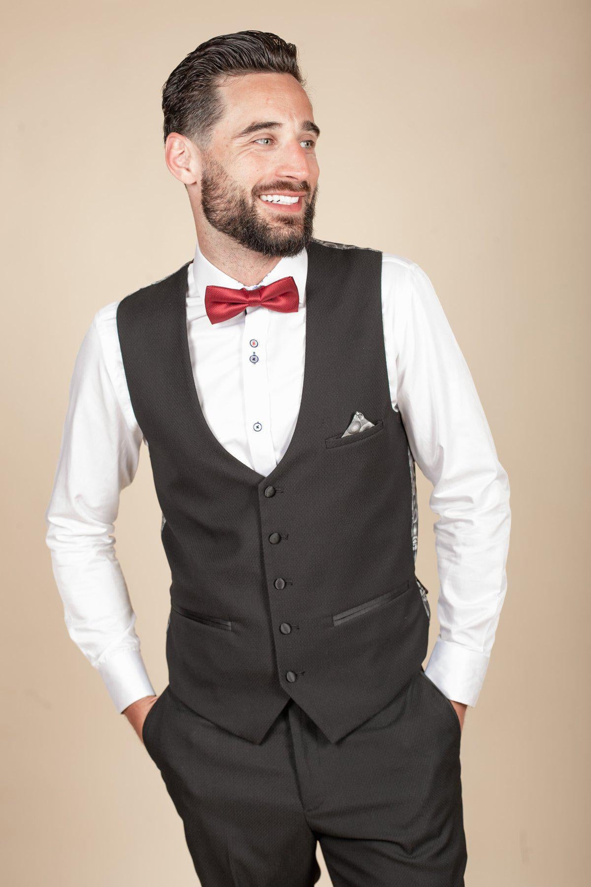 Owen Warner beams to the side in the marcdarcy Dalton Black Tuxedo—ideal for black tie events, as seen on 'I'm A Celebrity Get Me Out Of Here' 2022 Runner Up.