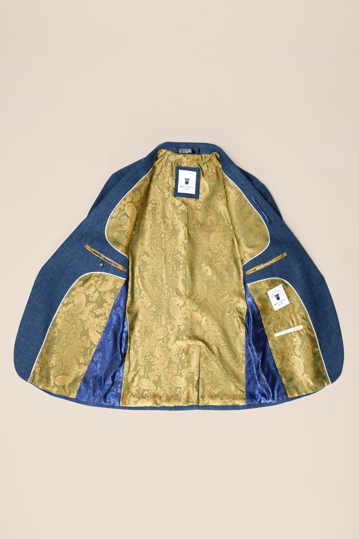 The marcdarcy DION Blue Tweed Check Suit With DX7 Oak Waistcoat is displayed open on a beige background, revealing refined tailoring with gold paisley lining, blue satin accents, and labeled interior pockets.